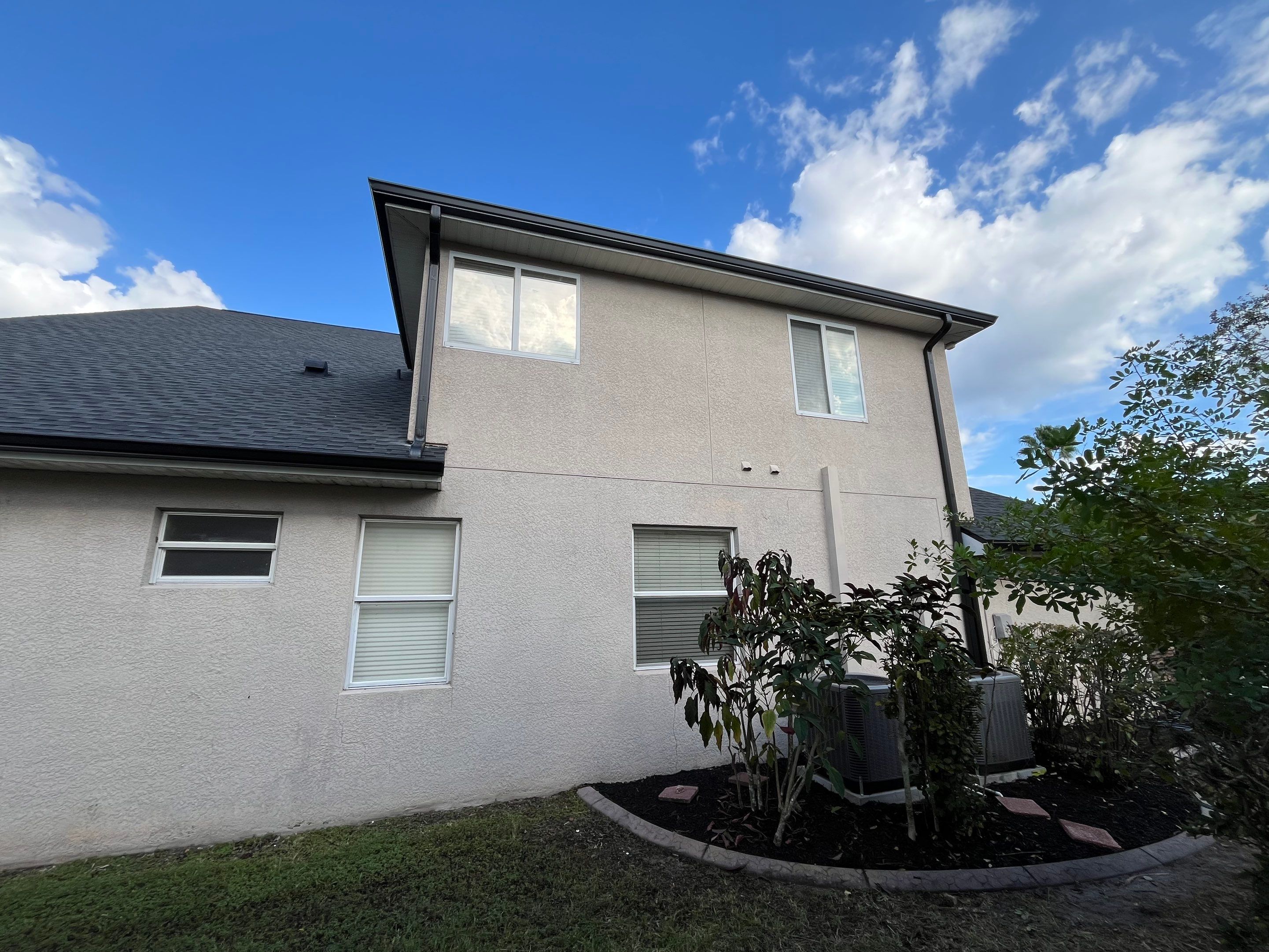Black 6-inch Seamless Gutters for Modern Ellenton Homes FL by Gutter Professors