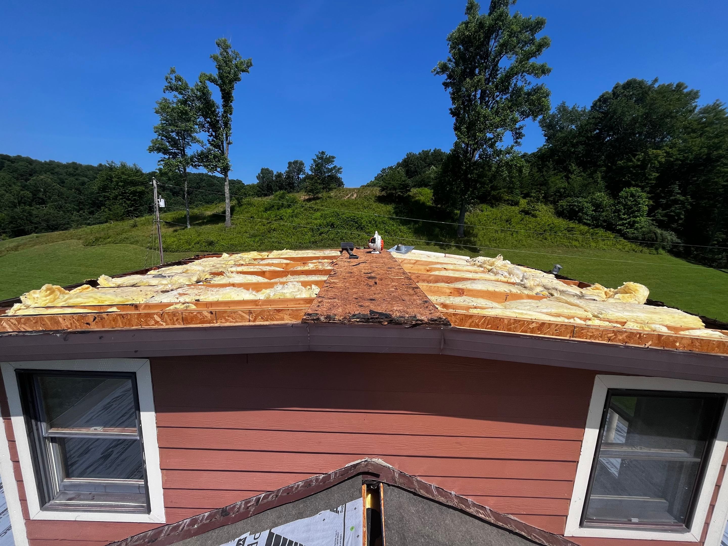 Residential Roofing Installation using GAF TImberline HDZ Hickory by Rainstoppers Roofing