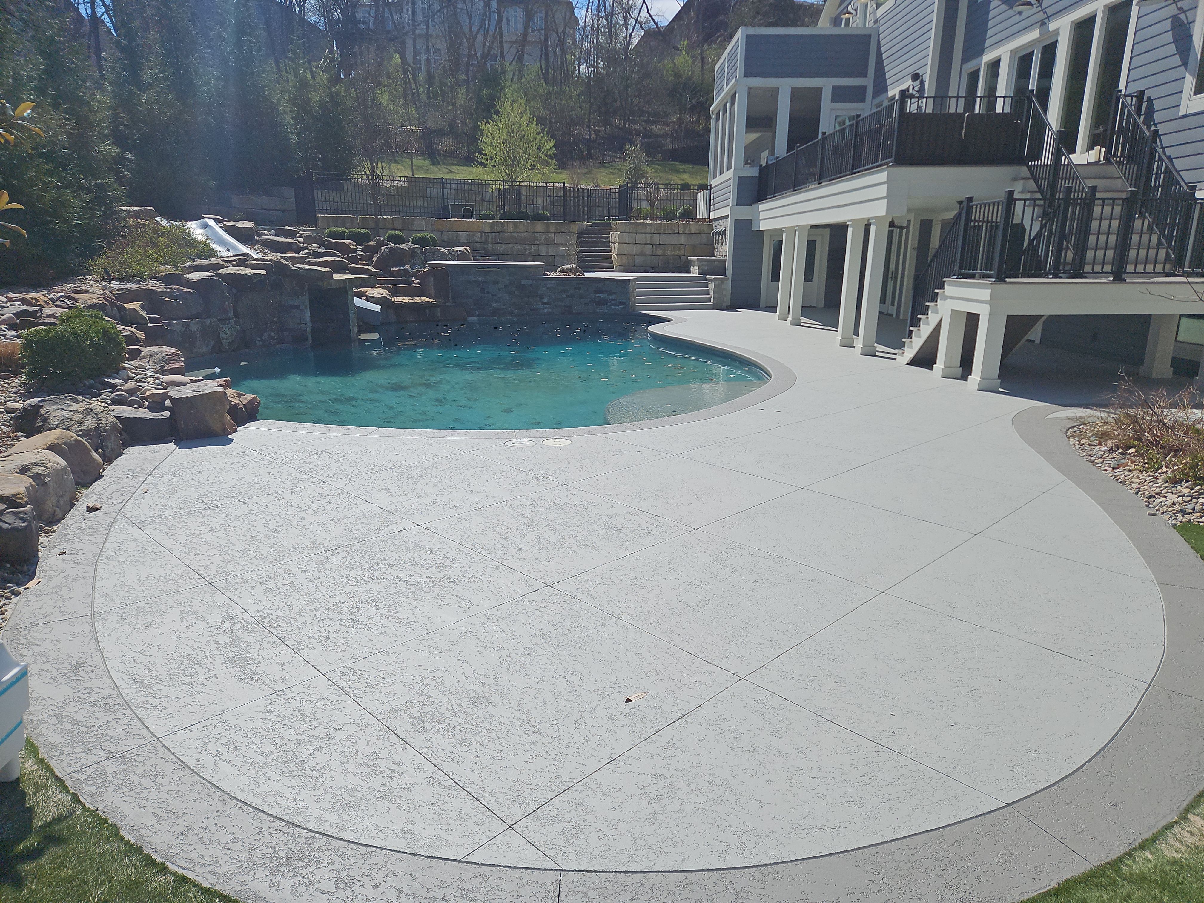Stilwell, KS -- Pool Deck Resurfacing by Big Red Decorative Concrete, LLC