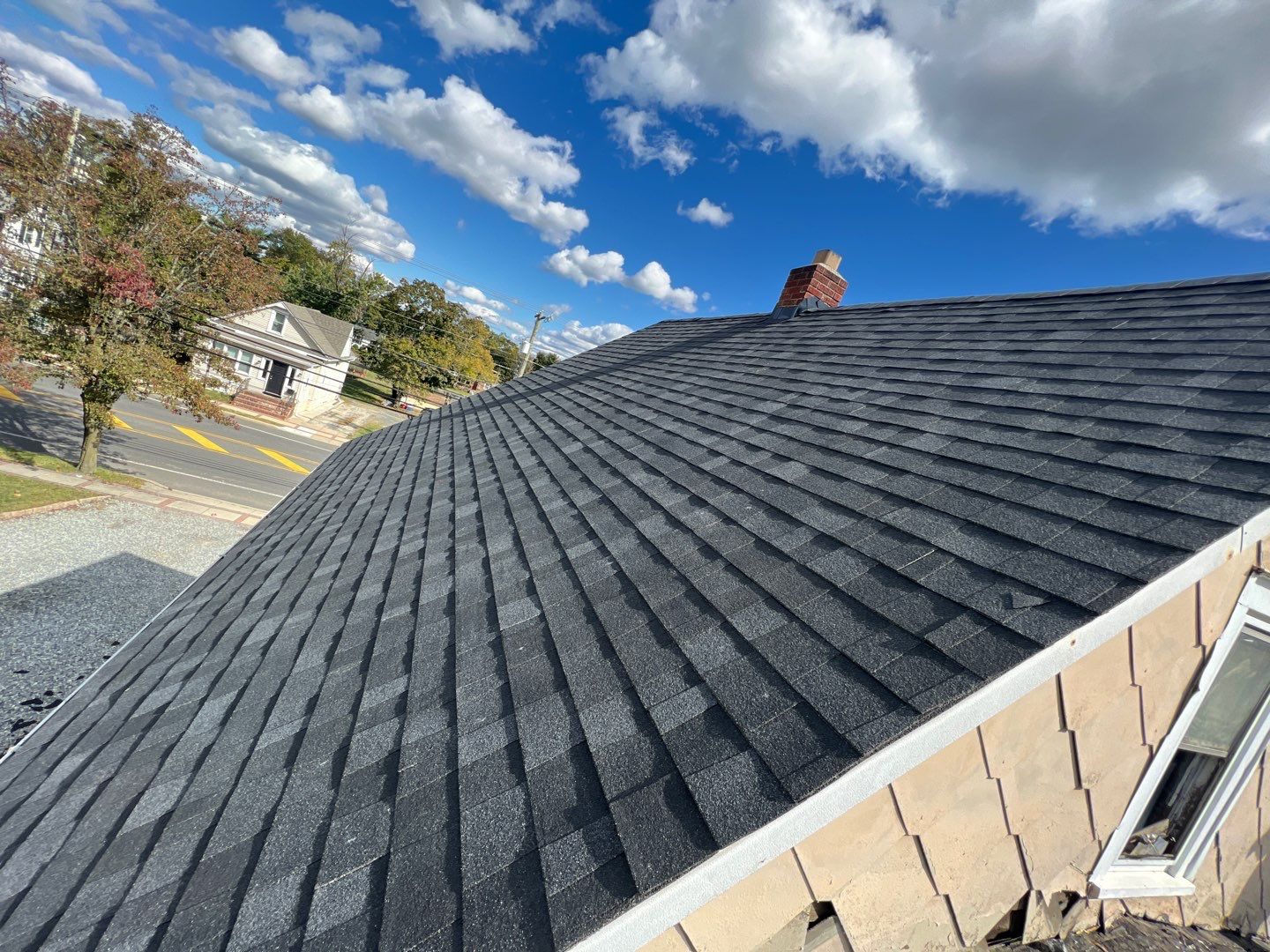 Onyx Black Shingles by Reimagine Roofing