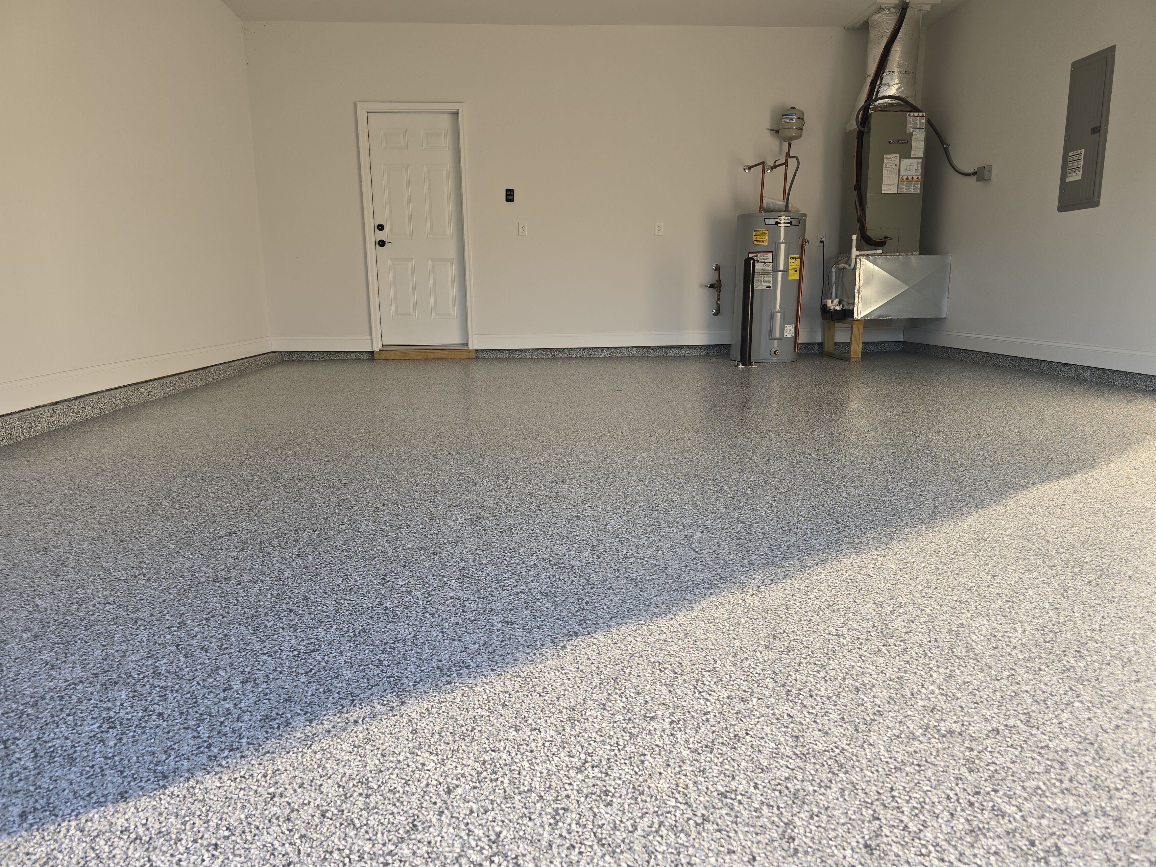 Garage using Gravel by Elite Floor Solutions