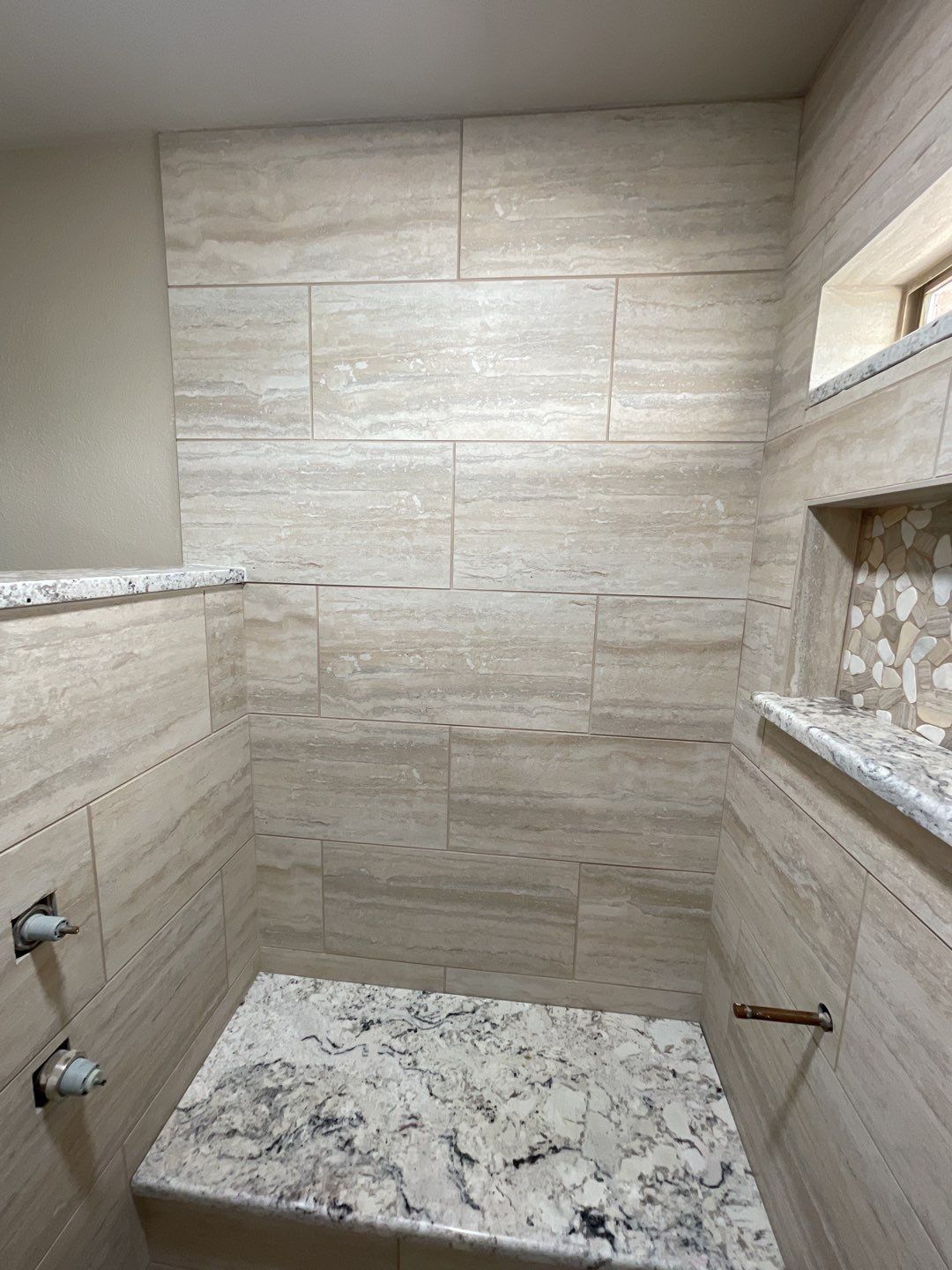 Bathroom Shower Remodel for a client by First United Roofing & Construction