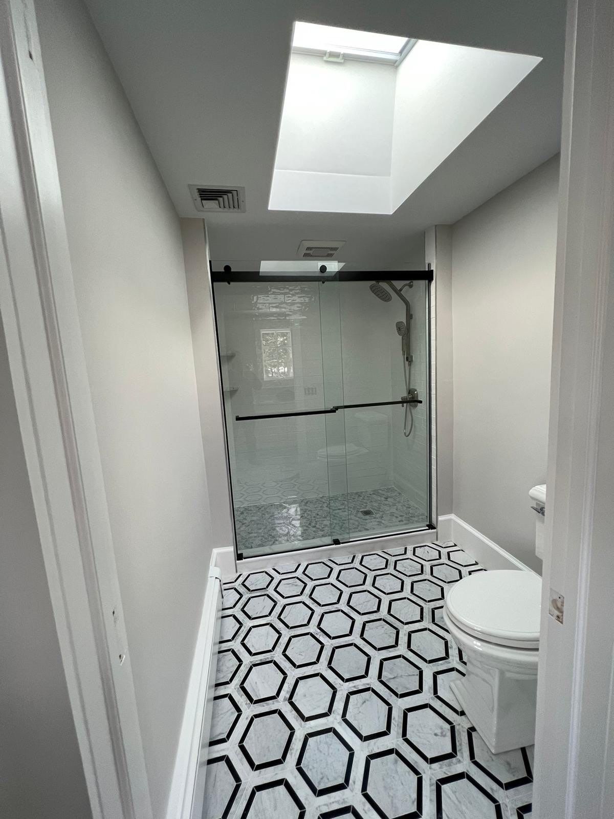 Bathroom Remodel using Tile by Home Concepts Construction