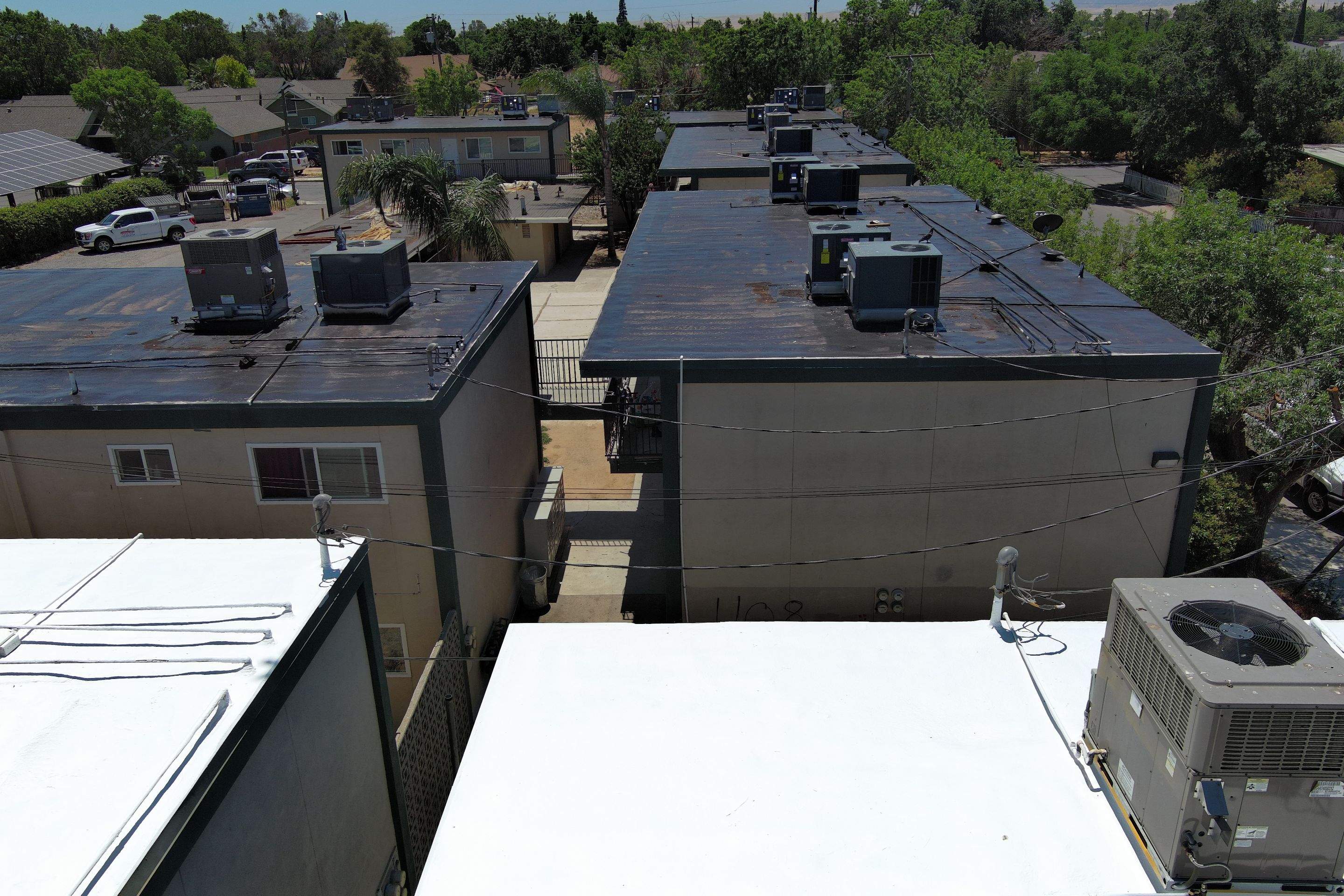 Foam Refurbish using General Coatings acrylic coatings and spray foam by Straight Edge Roofing Inc