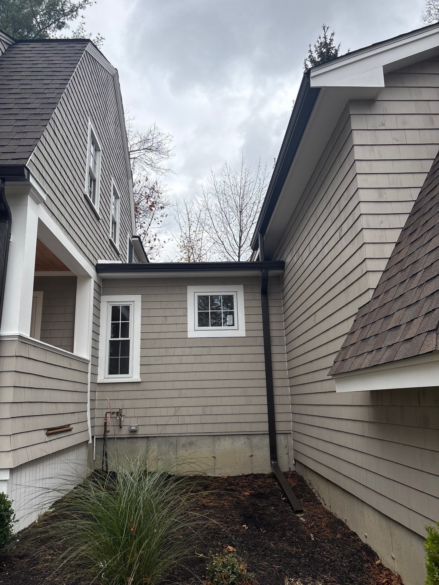 Andover Complete Gutter System with T-Rex Guards & Valley Splashguard by Mighty Dog Roofing of Greater Middlesex County