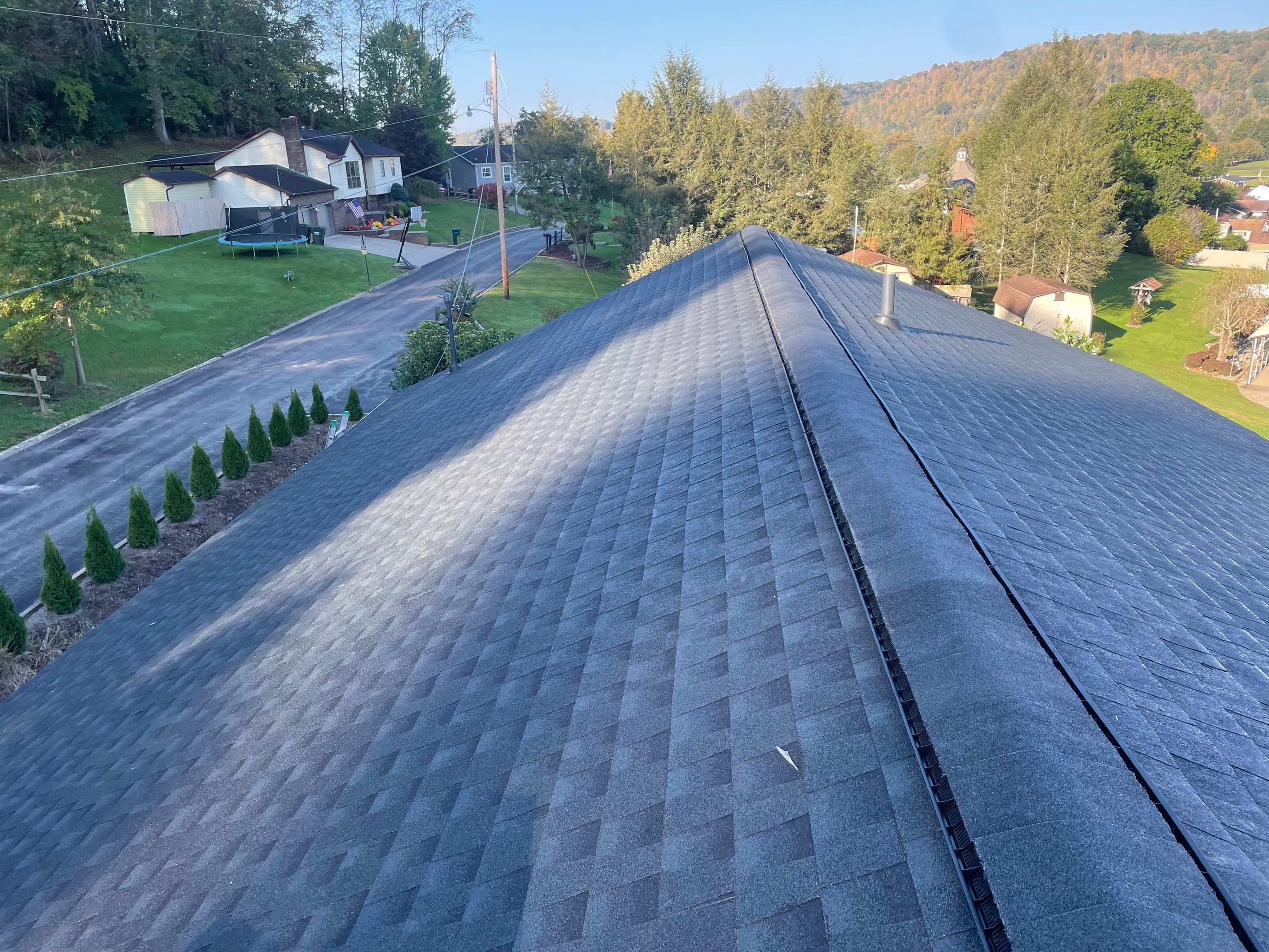 Residential Roofing Installation using GAF Timberline HDZ, Black by Rainstoppers Roofing