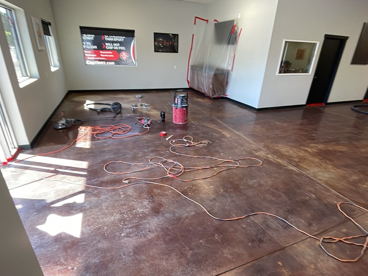 Equipment Share Commercial Floor Transformation using Smoke w/ 5% Orange by Croc Coatings, LLC