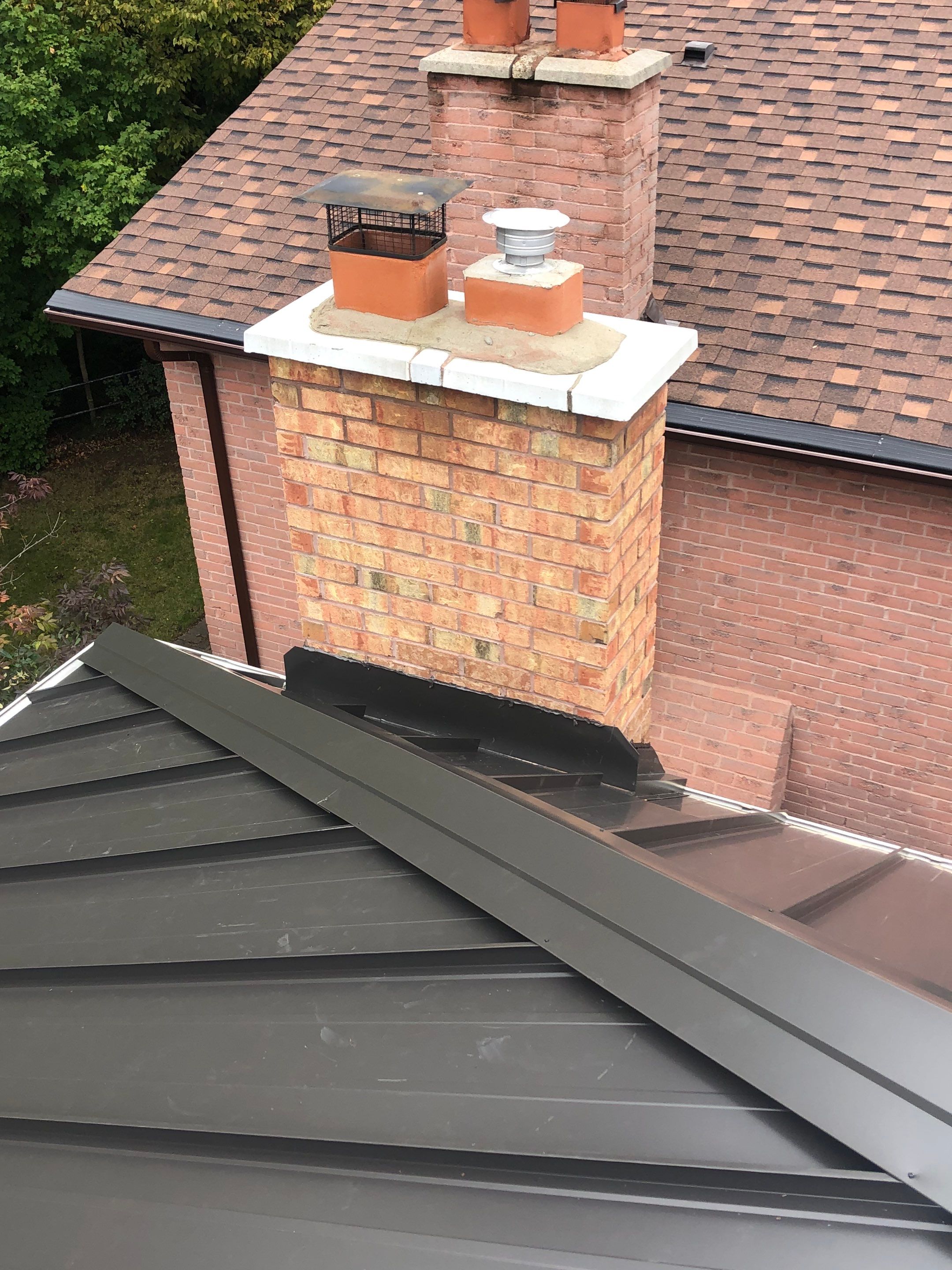 Residential Roofing Installation using 16" Standing Seam Panels by Jay Carter Roofing & Sheet Metal