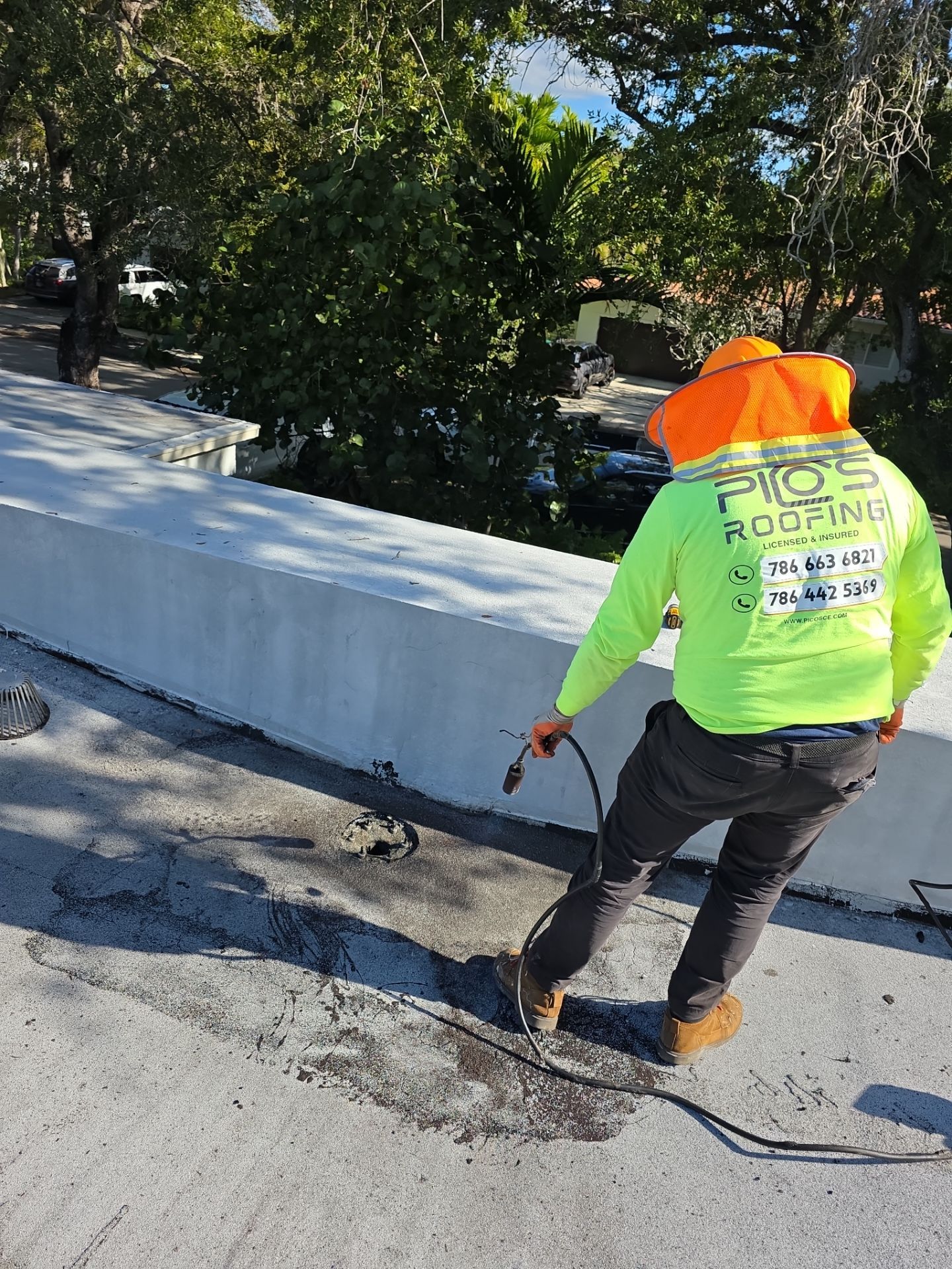 Flat Roof Silicone Coating and Interior Water Damage Restoration in Miami by Picos Construction Engineering