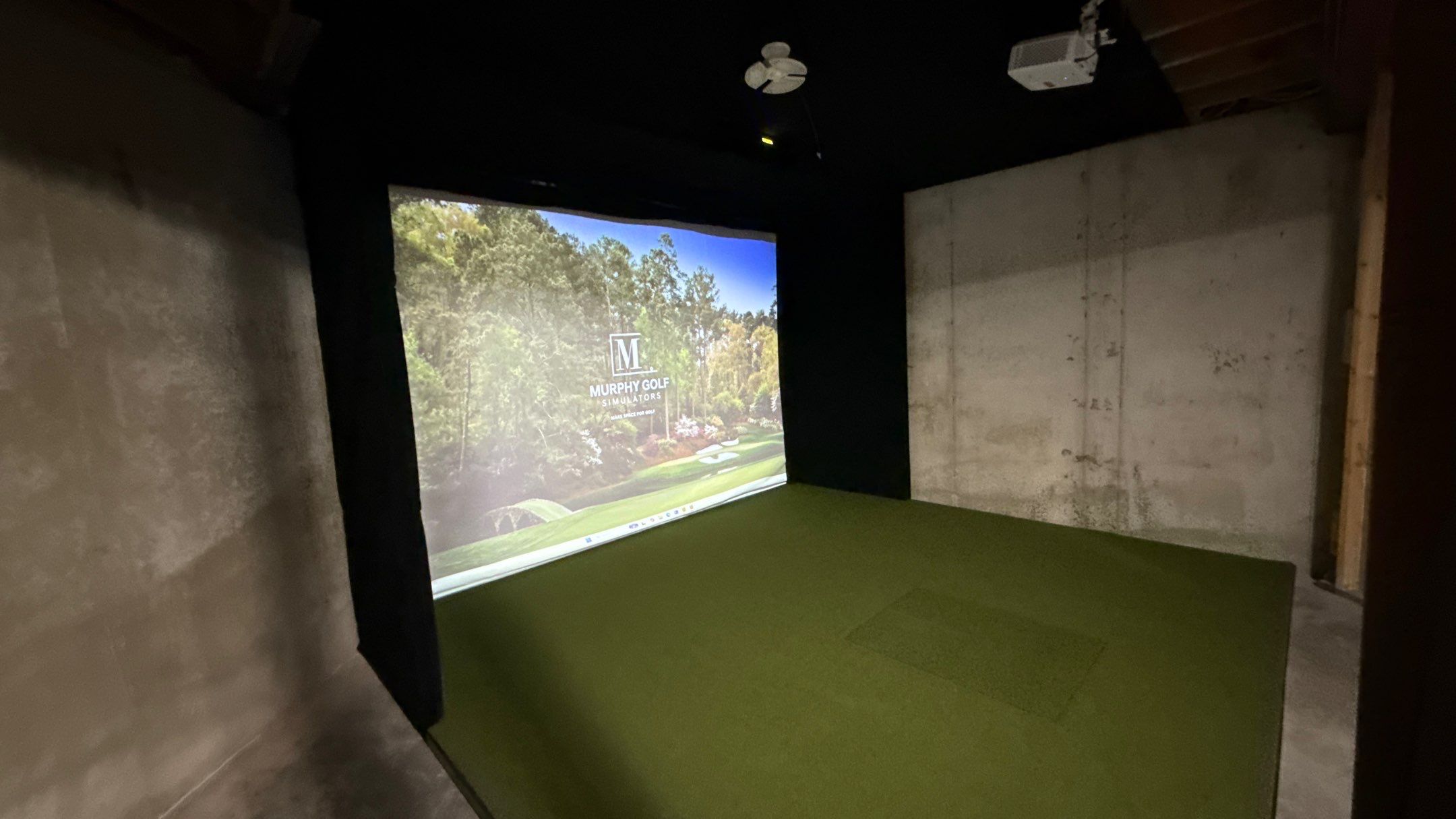 Rex Went With A Custom Golf Simulator  by Banner Garage