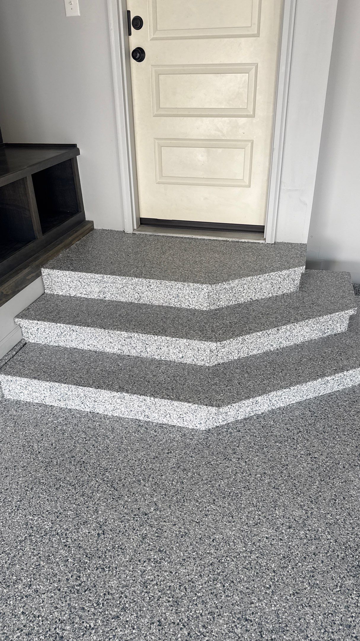 Comprehensive Garage Renovation Featuring Epoxy Flooring and Custom Storage in Shawnee by Banner Garage