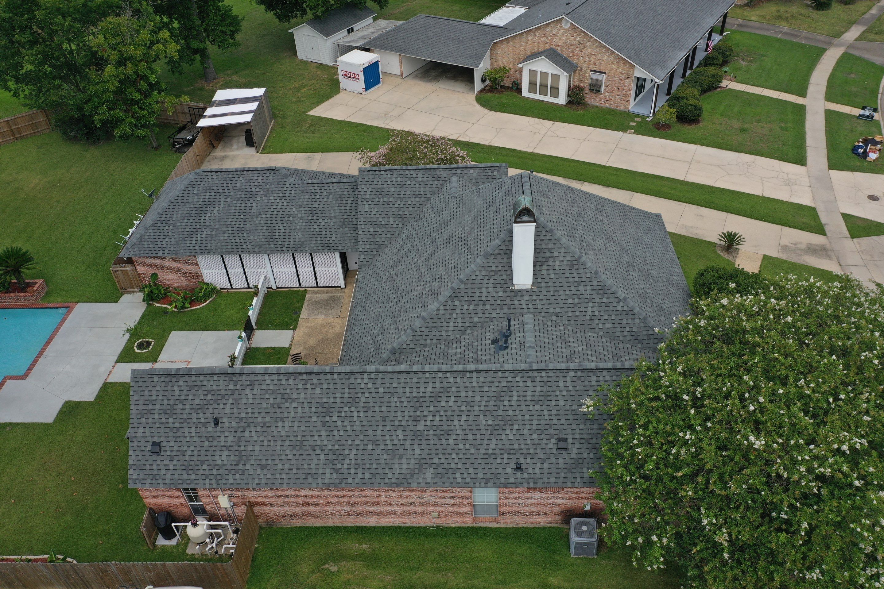 Residential Roofing Installation using Atlas Pinnacle Pristine Hearthstone by Top Team Construction