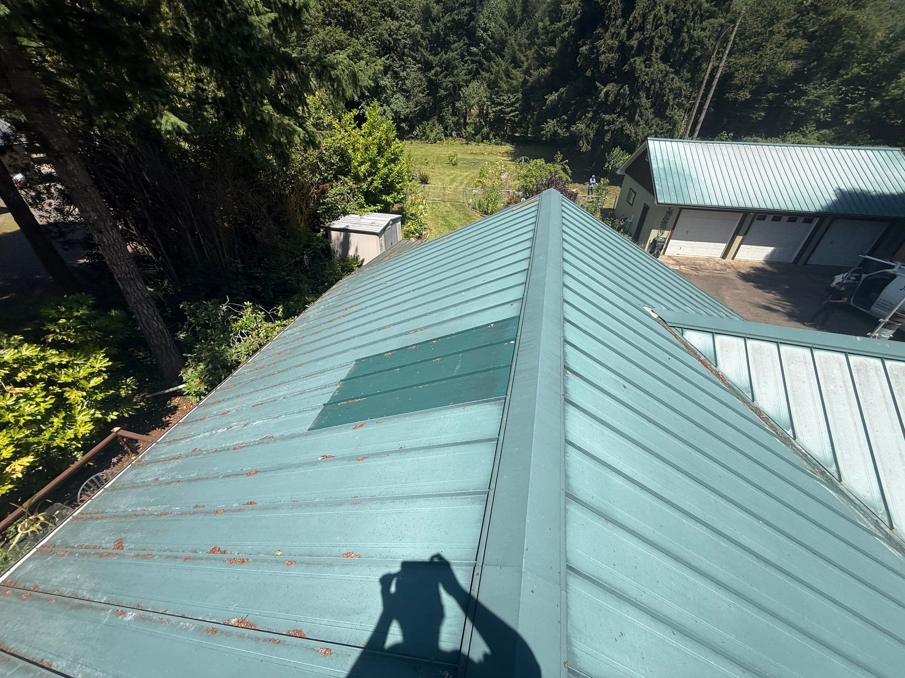 Log Cabin Metal Roof Repair and Skylight Maintenance in Springfield by BEST Roofing & Waterproofing
