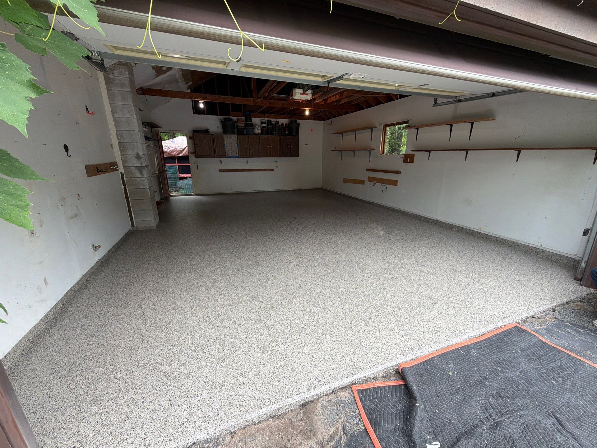 Vintage Goldmine Garage Coating by NG Masonry & Construction LLC