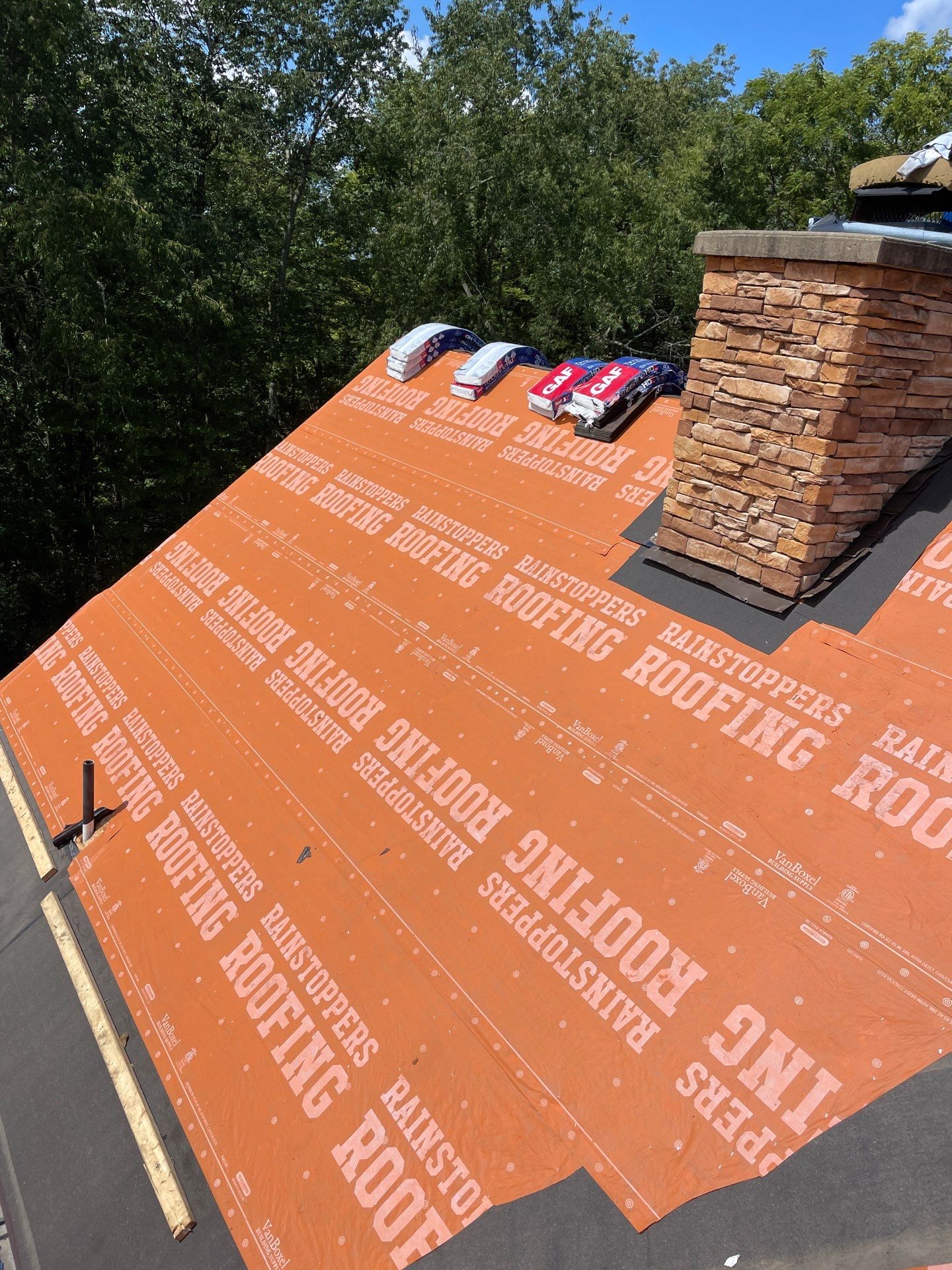 Residential Roofing Installation using GAF TImberline HDZ Hickory by Rainstoppers Roofing