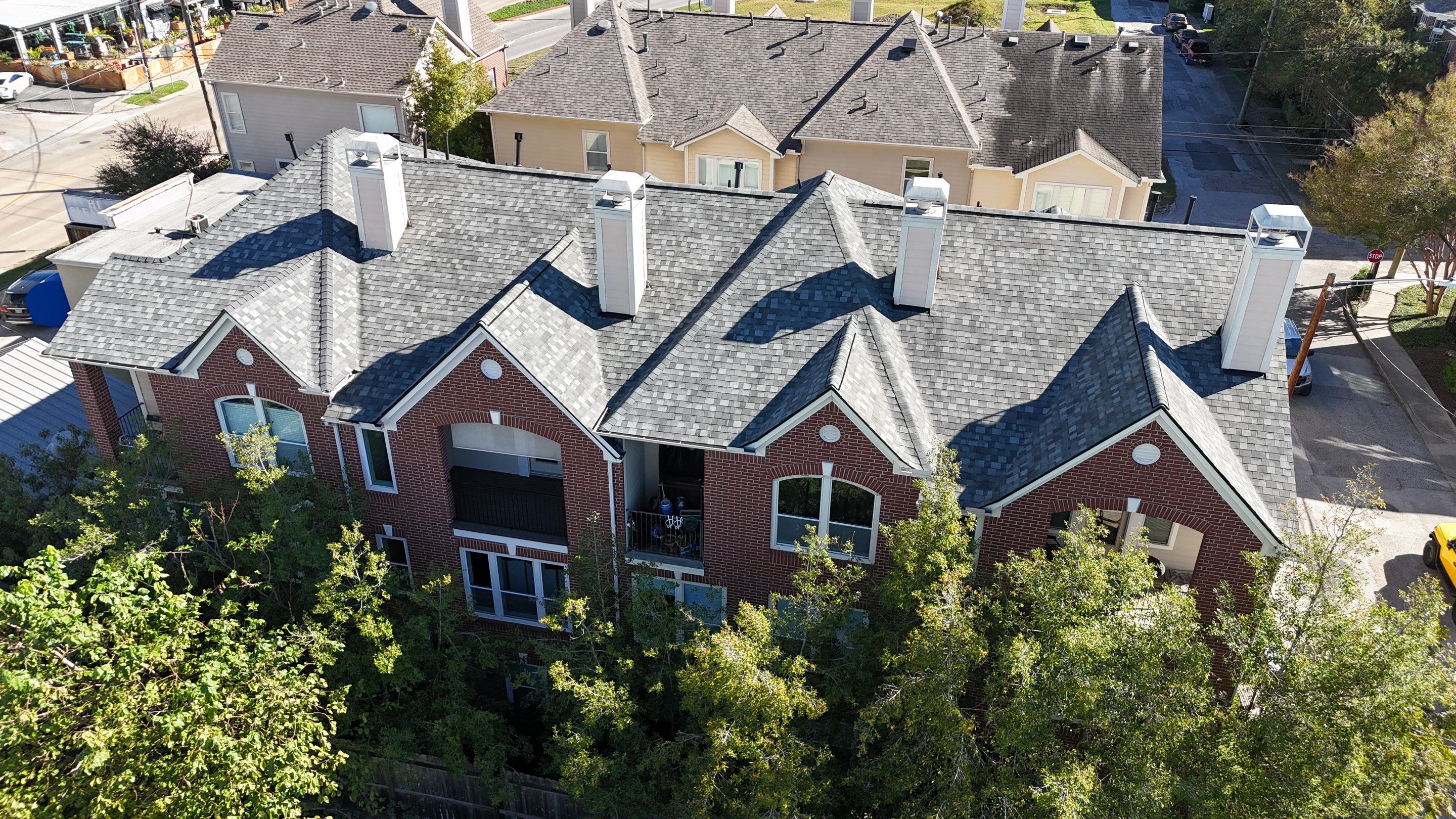 Townhome Complex Roof Replacement in the heart of Houston! by Core Four Roofing