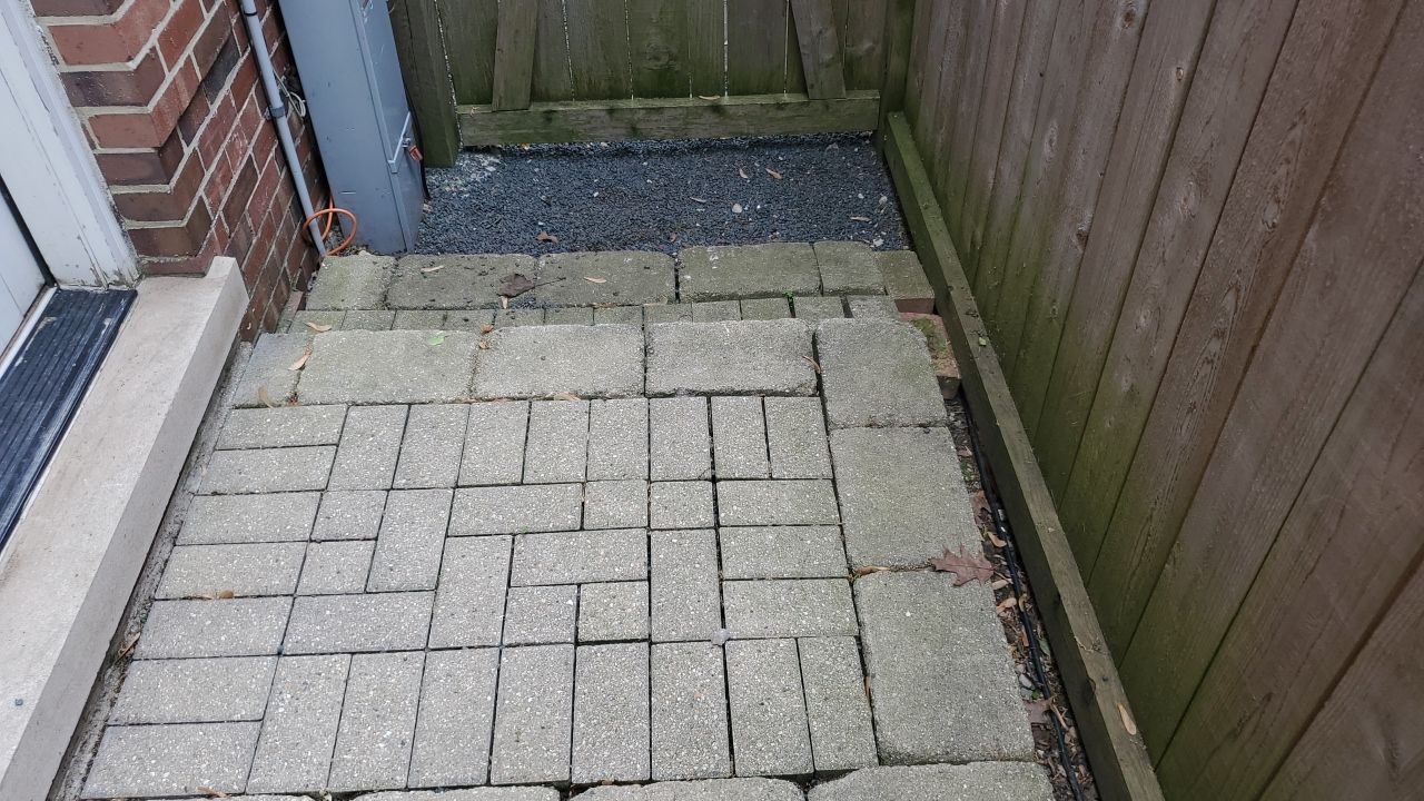 Brick patio repair, clean sand and seal by Northern Power Washing LLC.