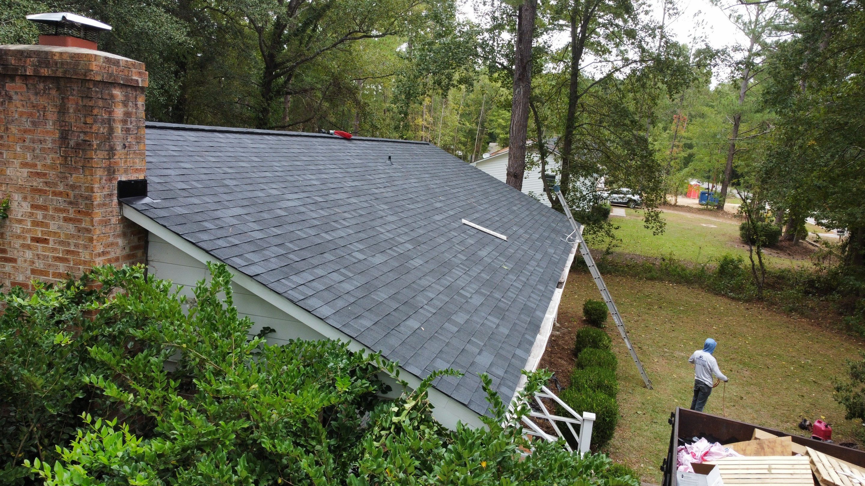 New Onyx Black Shingle Roof Replacement and Tree Damage Repair. by Midlands Roofing & Exteriors