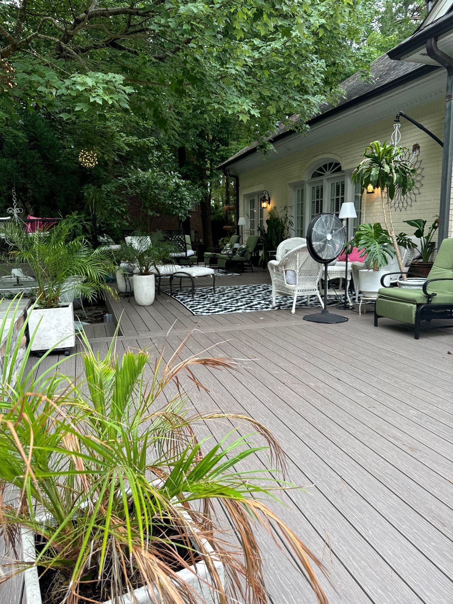 New Deck, Stone Fountain Feature, Circle Stone Sitting Area with Fireplace by The Remodeling Company