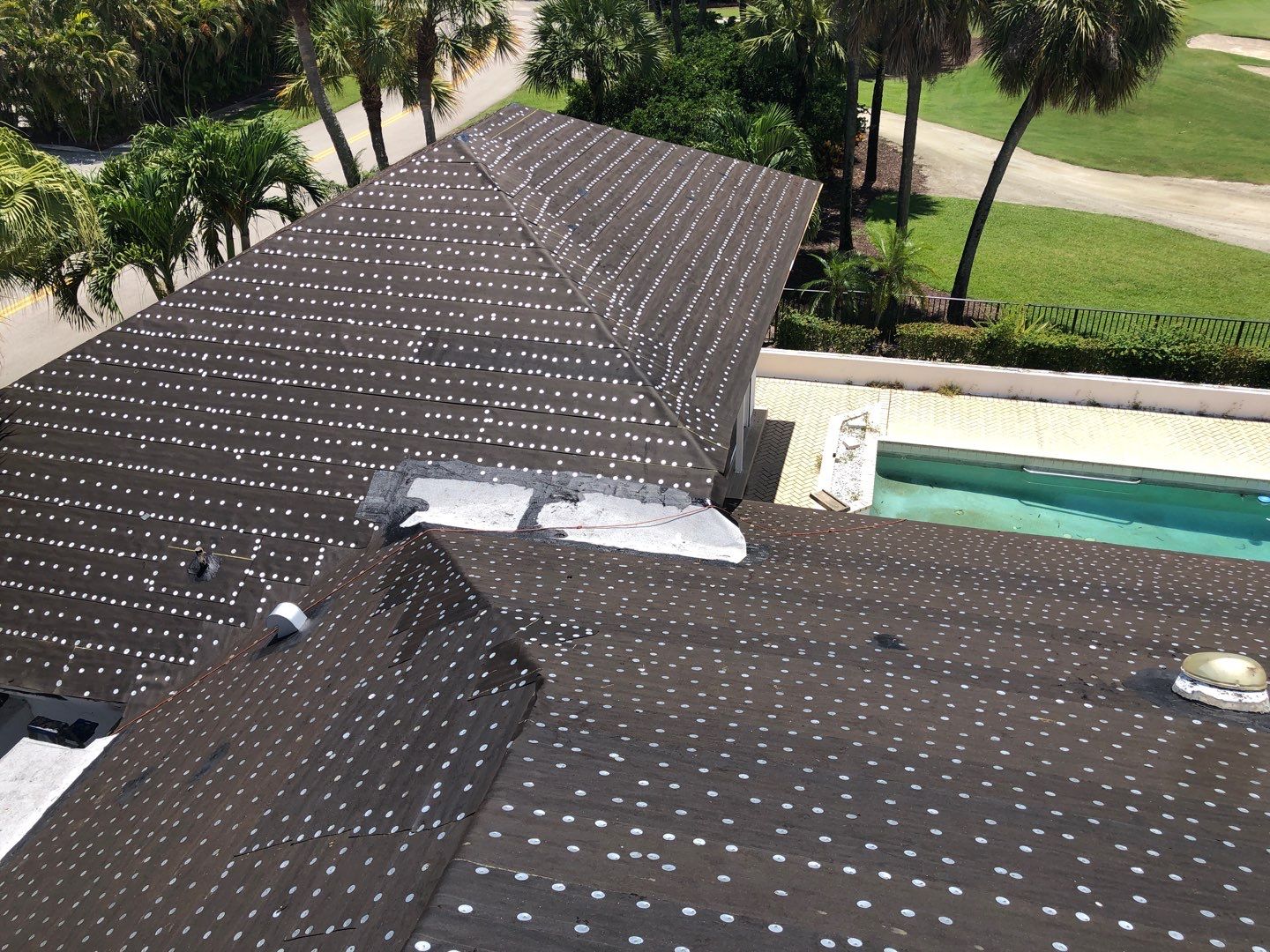 Residential Roofing Installation using 1" Nail strip metal roof by BLUES BROTHERS ROOFING