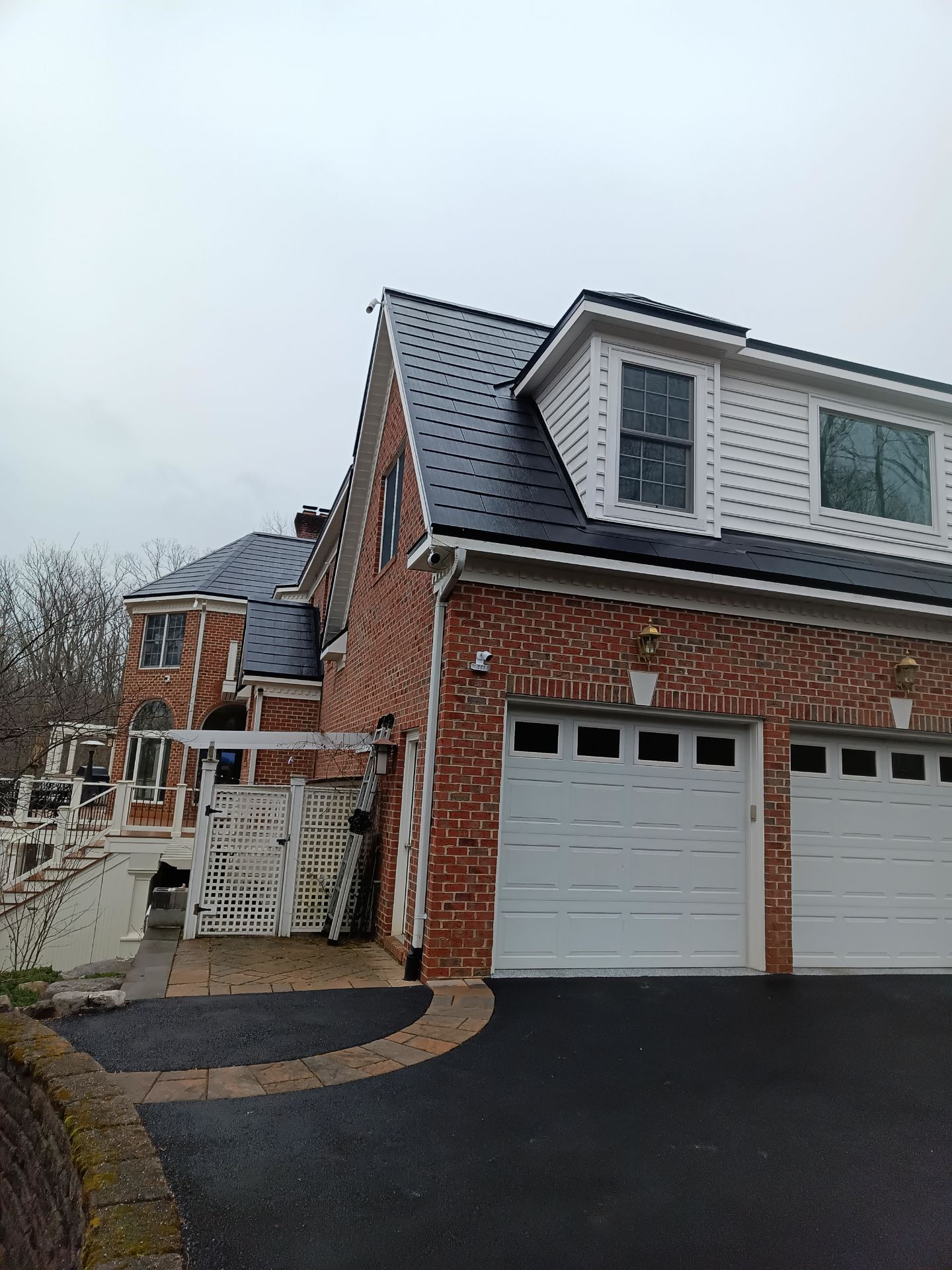 Tesla Solar Roof Replacement  by American Home Contractors
