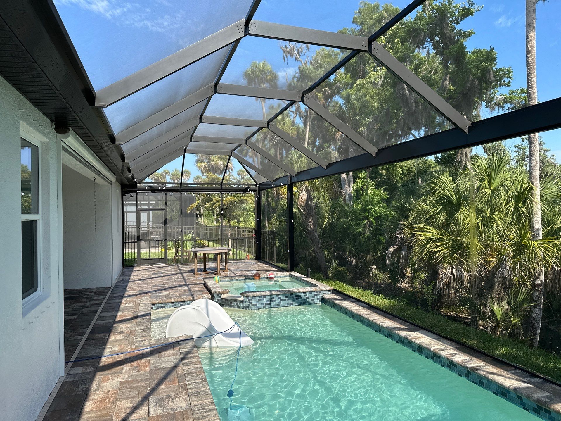Screen Enclosure & Paver Pool Deck Cleaning in Trevesta Community, Palmetto, FL | Sunshine AquaWash by Sunshine AquaWash