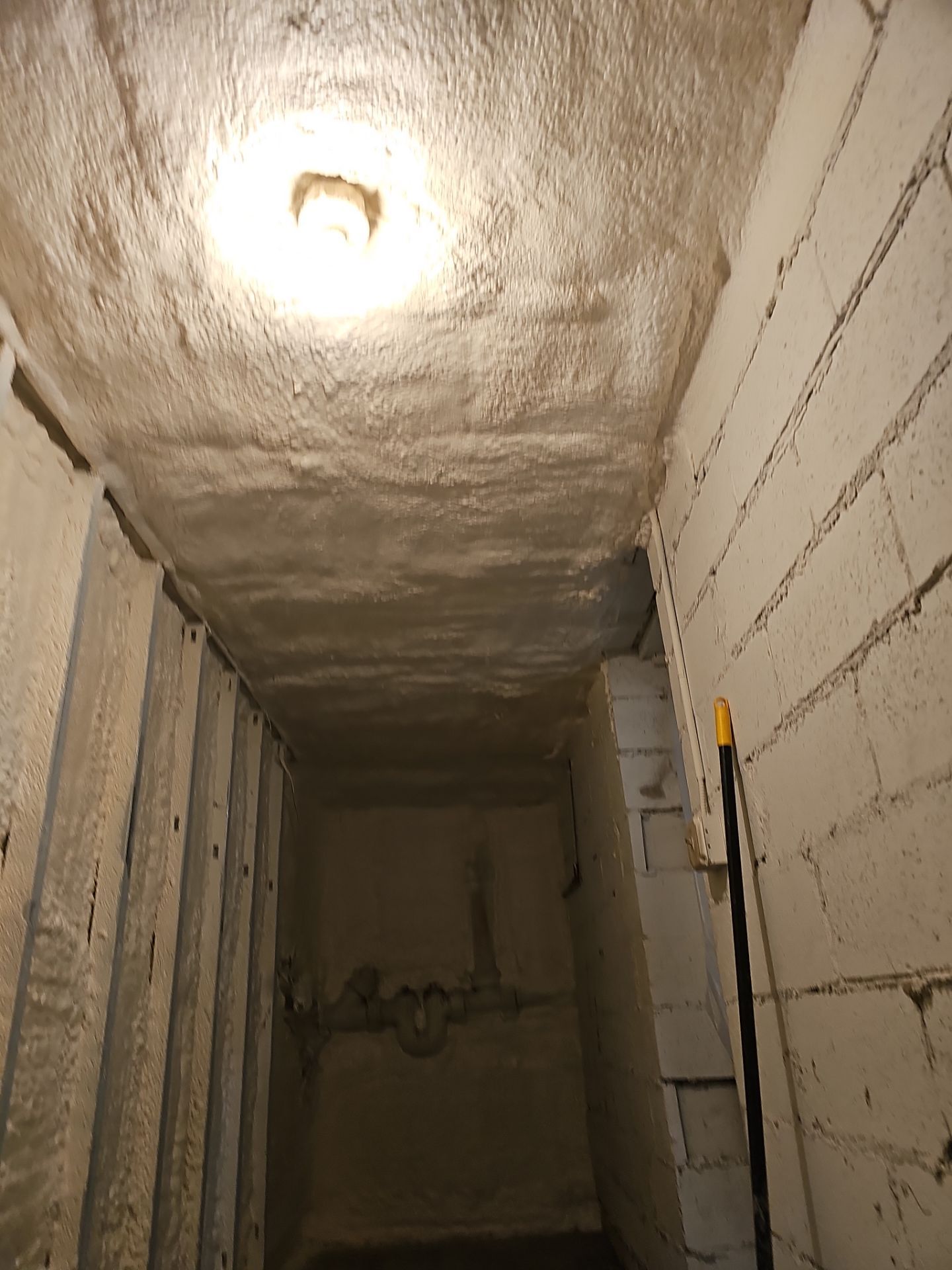 Basement Exterior Walls using Closed Cell Spray Foam by NYS Foam & Energy