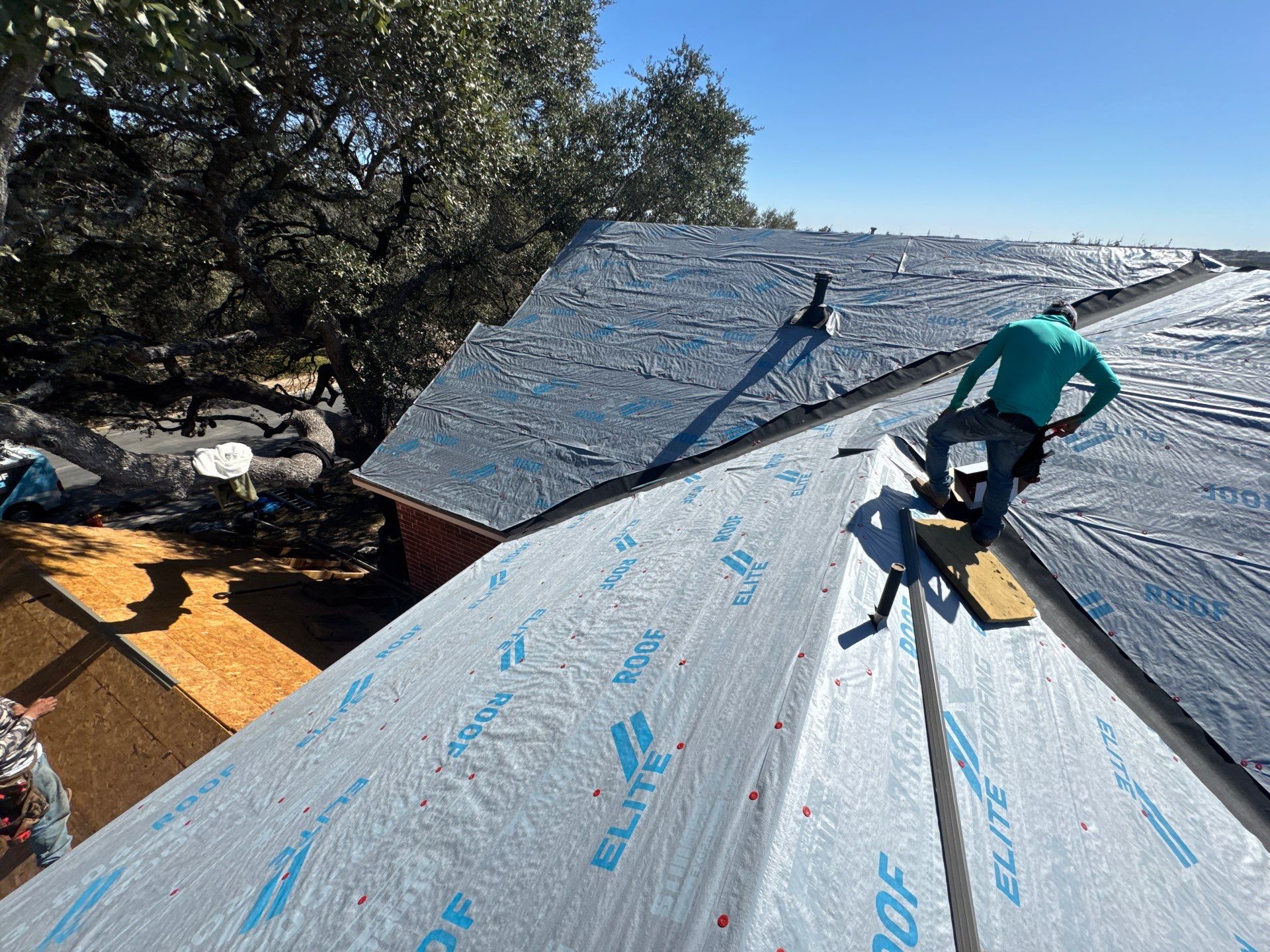 Residential Roof Replacement using ATLAS PROLAM WEATHER WOOD by Elite Roofing LLC