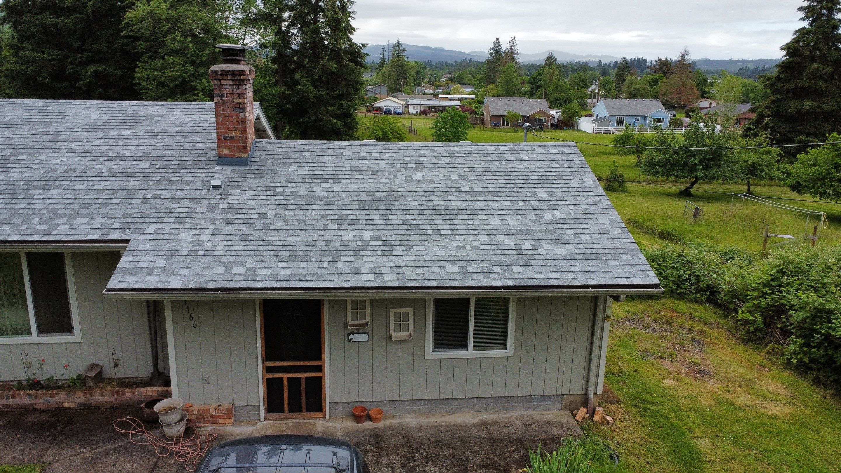 Residential Roofing Installation using IKO Dynasty (Color: Frostone Grey) by Orezona Building & Roofing Company, Inc.