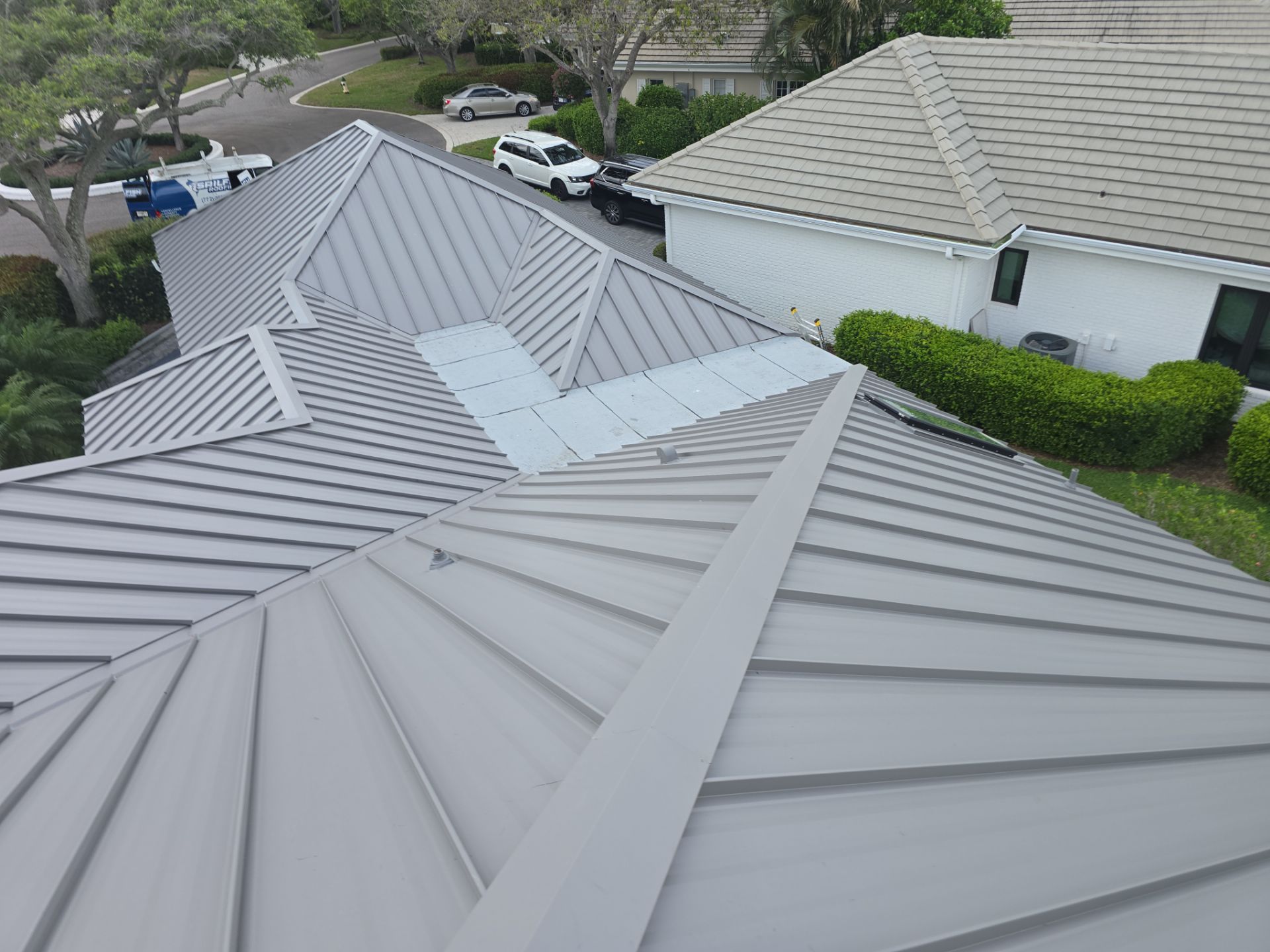 Kynar (Color Coated) 1.5" Standing Seam Metal Roof Installation by Sailfish Roofing