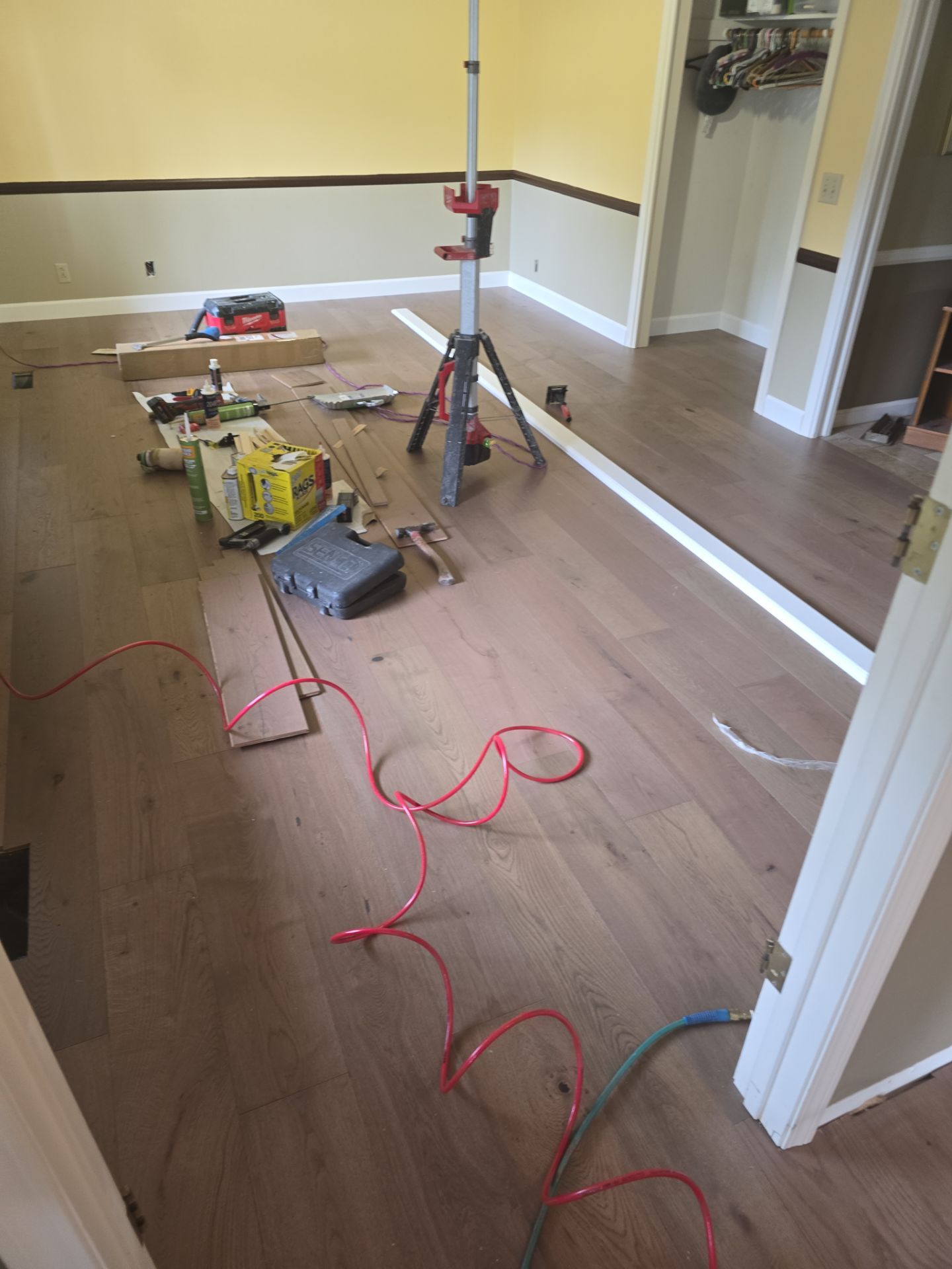 Engineered Wood Flooring Installation and Staircase Upgrade in Brookings by KMD Surfaces INC.