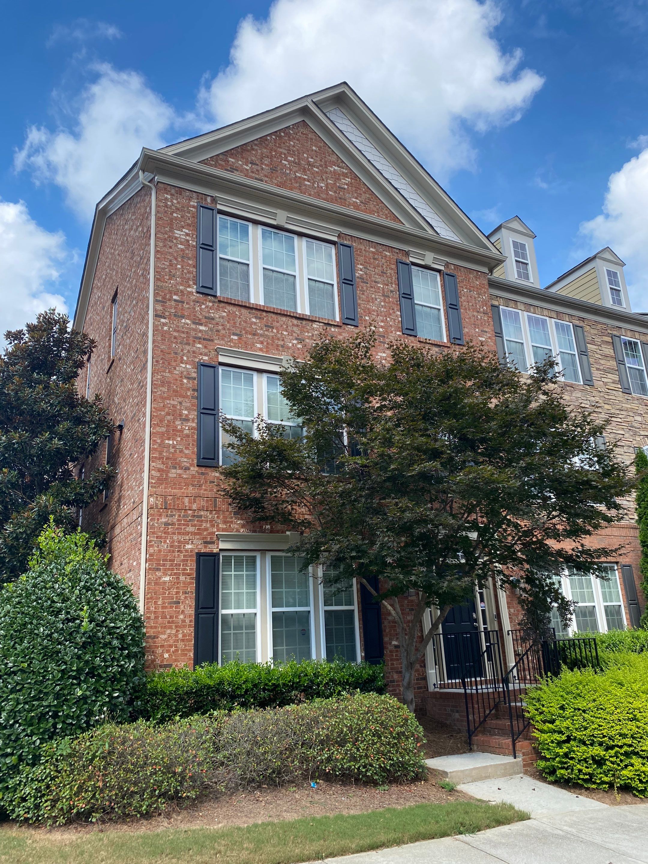 Exterior Trim and Shutter Painting for Atlanta Brick Townhomes by Swift Home Renovations