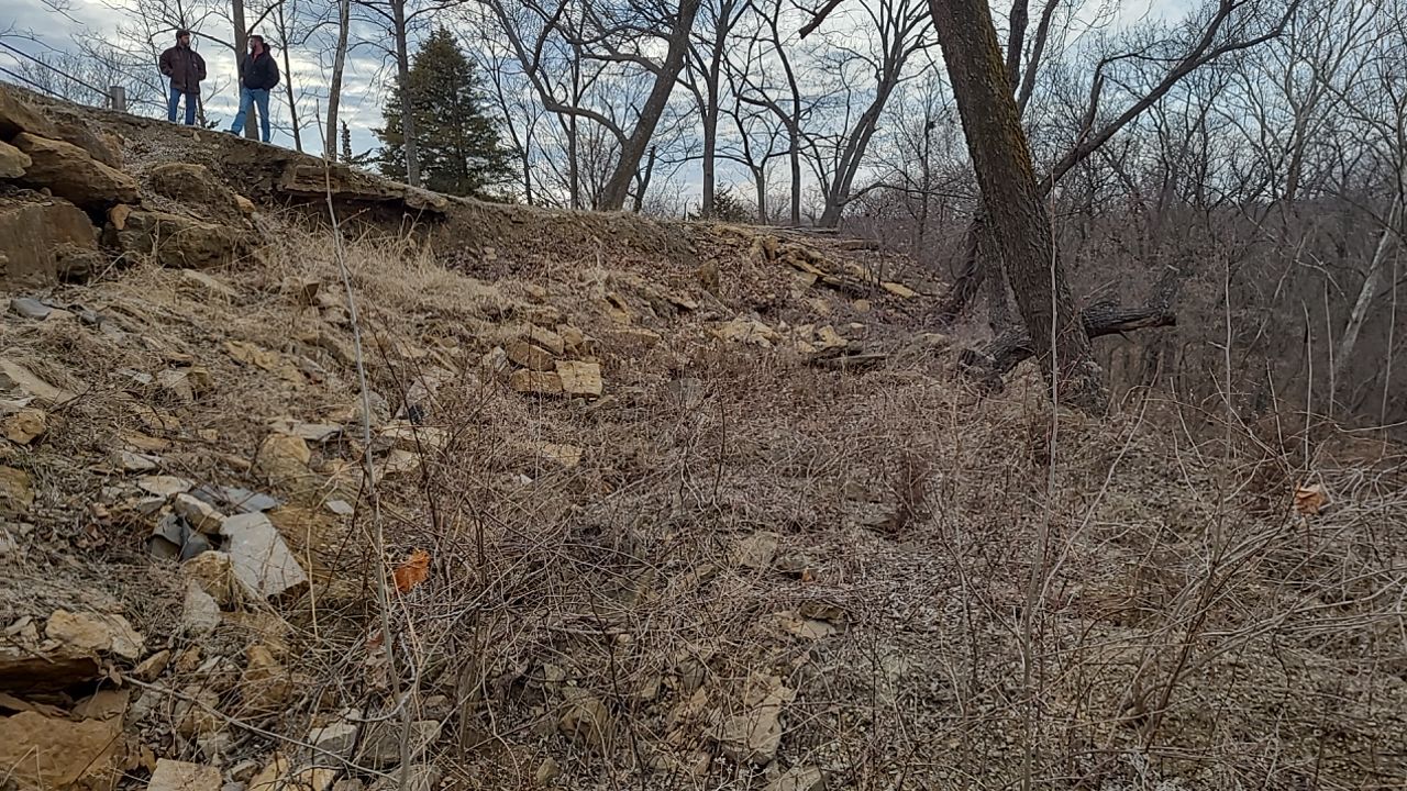 Supporting back of home with backfill at edge of steep creek by LAND ESCAPES LLC