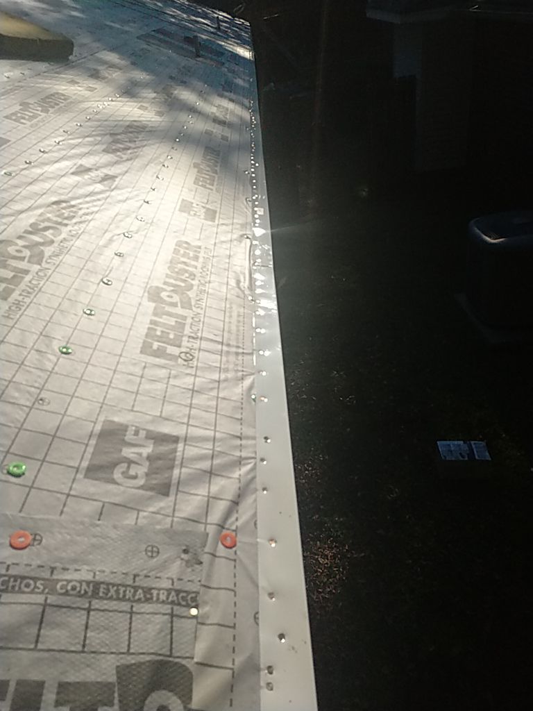 Residential Roofing Installation using Roof Replacement by American Roofing & Construction LLC