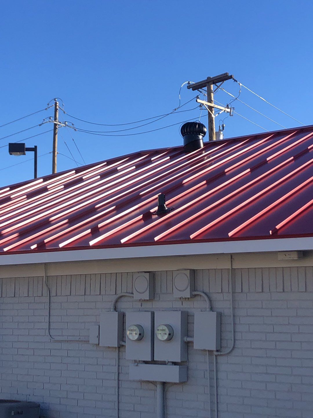 Commercial metal roof by Springtree Restoration 