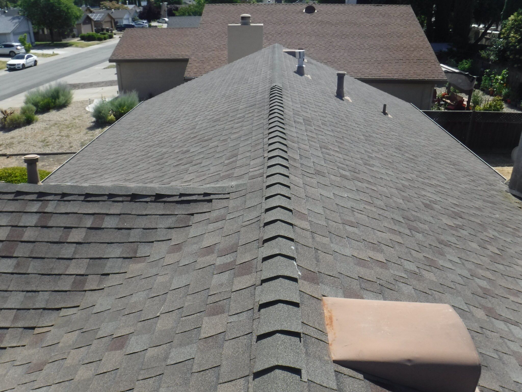 New Roof and Gutters adds value to this home by Byers Enterprises 