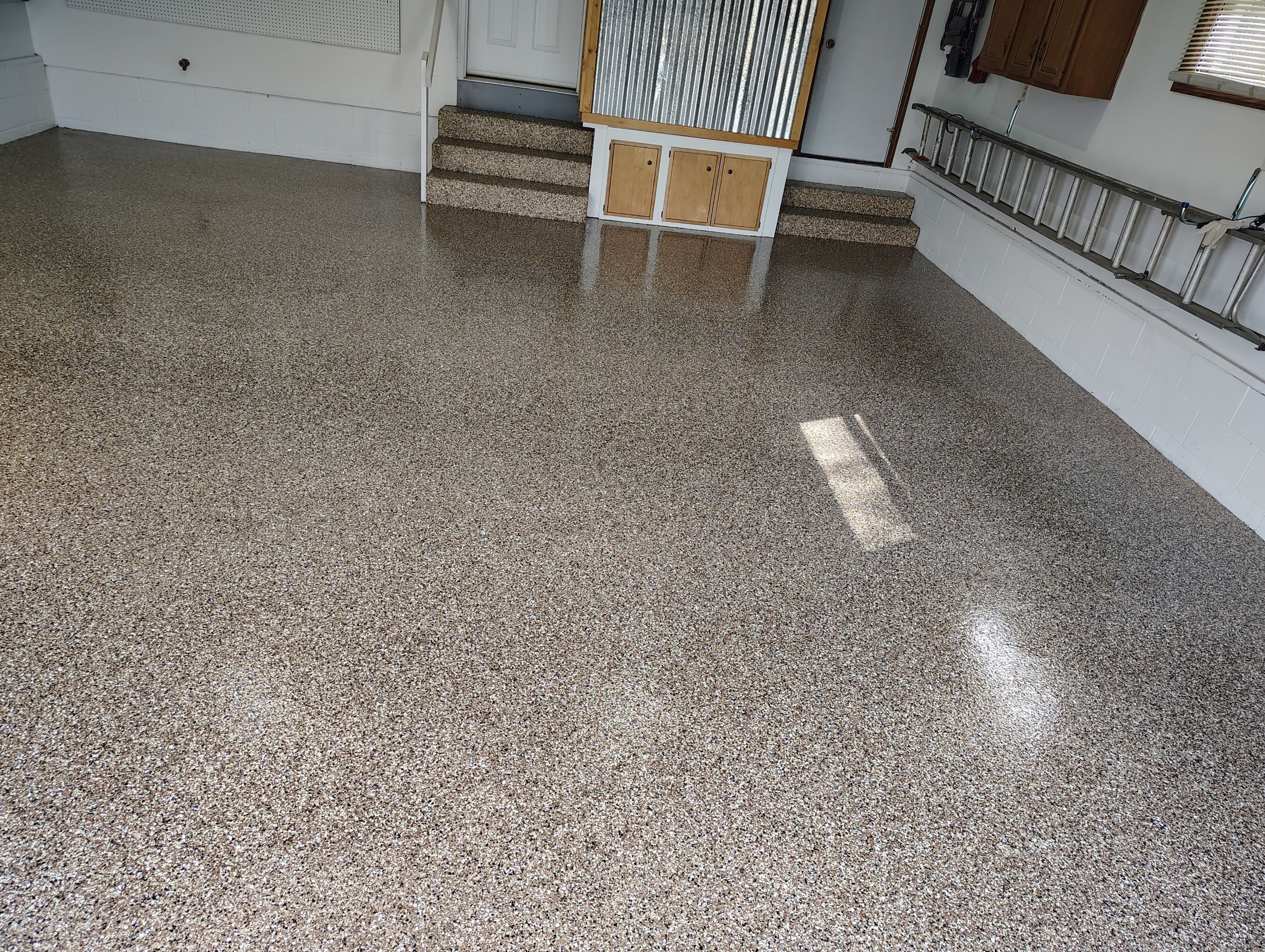 Multi-Colored Flake Epoxy Garage Floor Coating and Crack Repair by Select Painting, Coatings & Garage Cabinets