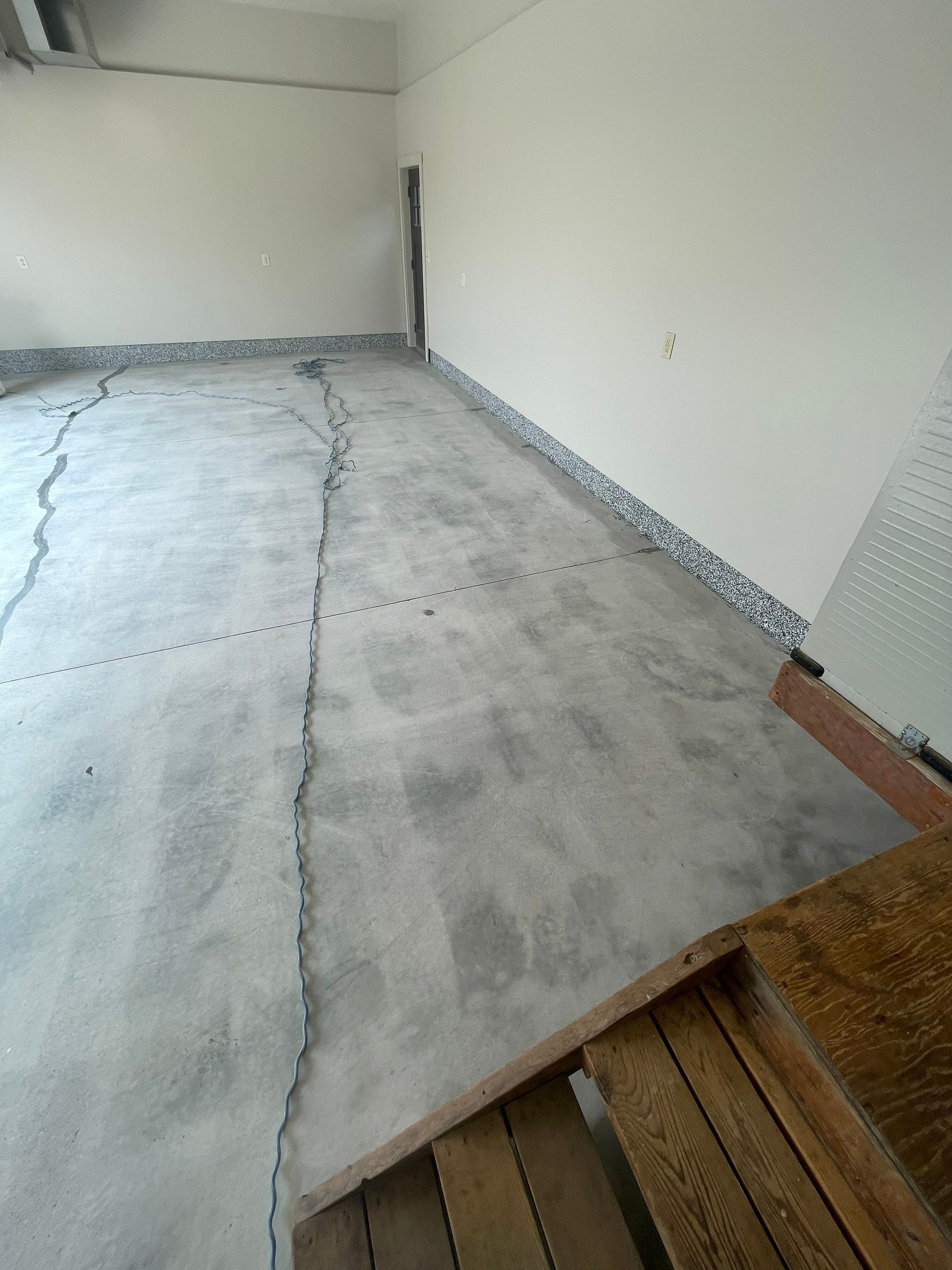 Domino Flake Floor Coating and Crack Repair in Chancellor by Select Painting, Coatings & Garage Cabinets