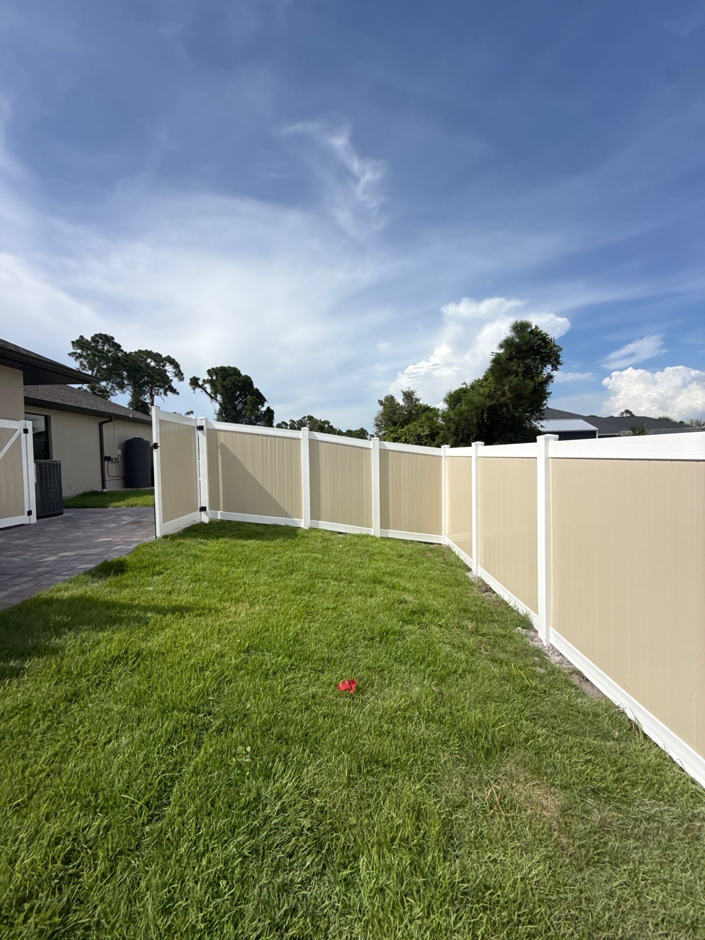 Custom Two-Tone Vinyl Privacy Fence Installation in North Port by True Fence LLC