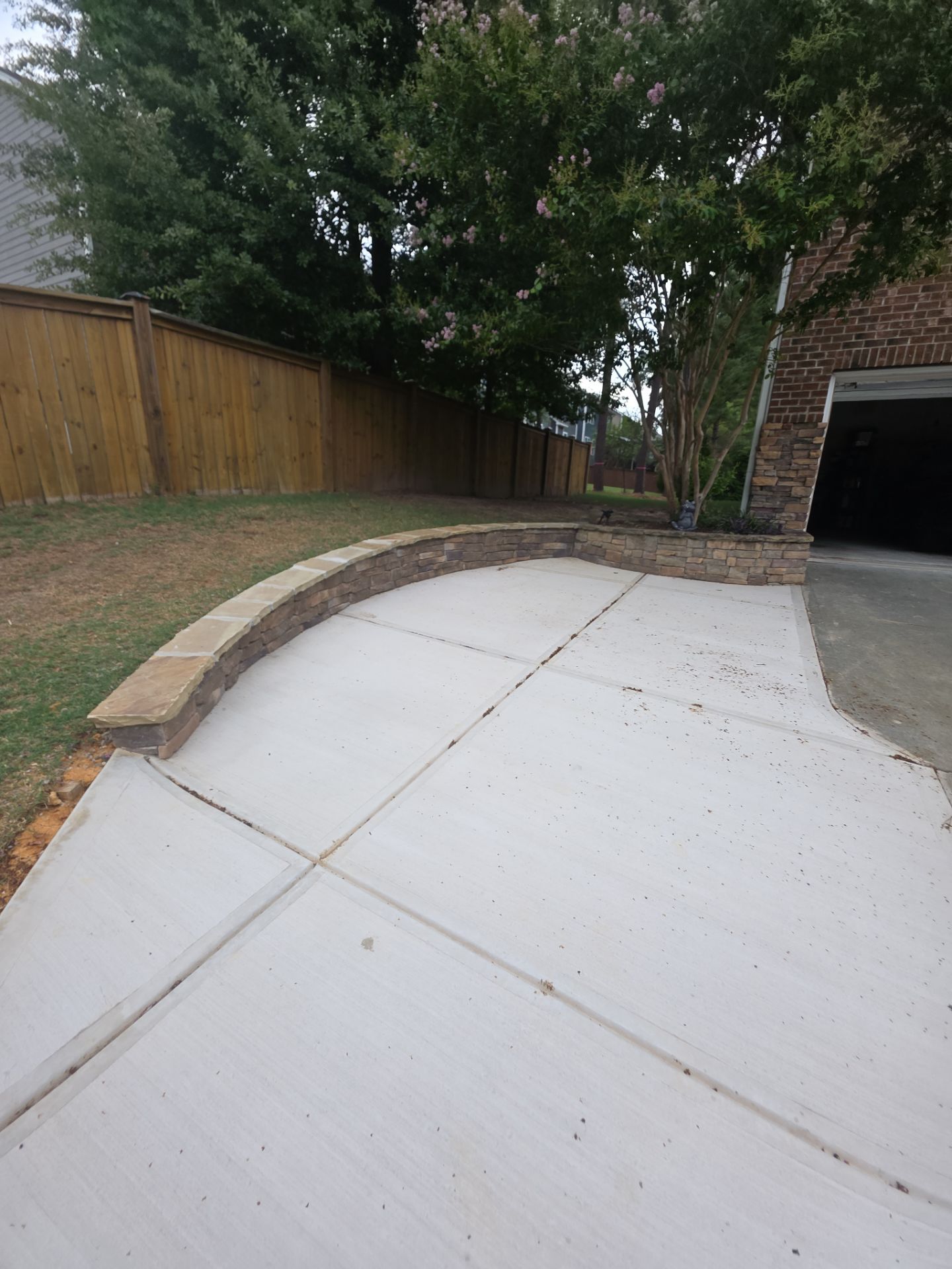 Concrete Driveway Expansion & Retaining Wall | Apex, NC by Elite Remodeling and Design LLC