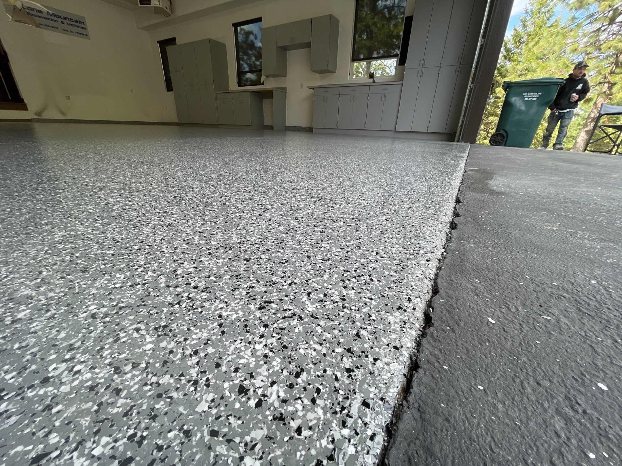 Garage Transformation using Smoke and the Penntek Evolution System by Croc Coatings, LLC