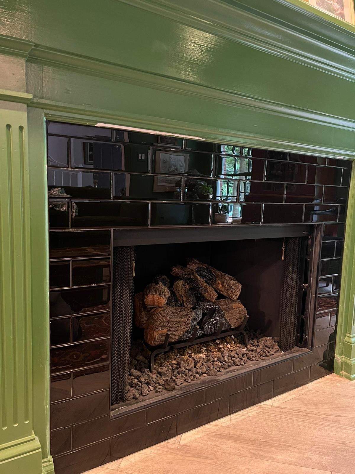 Fireplace tile upgrade by Footprints Bath and Tile of East Atlanta
