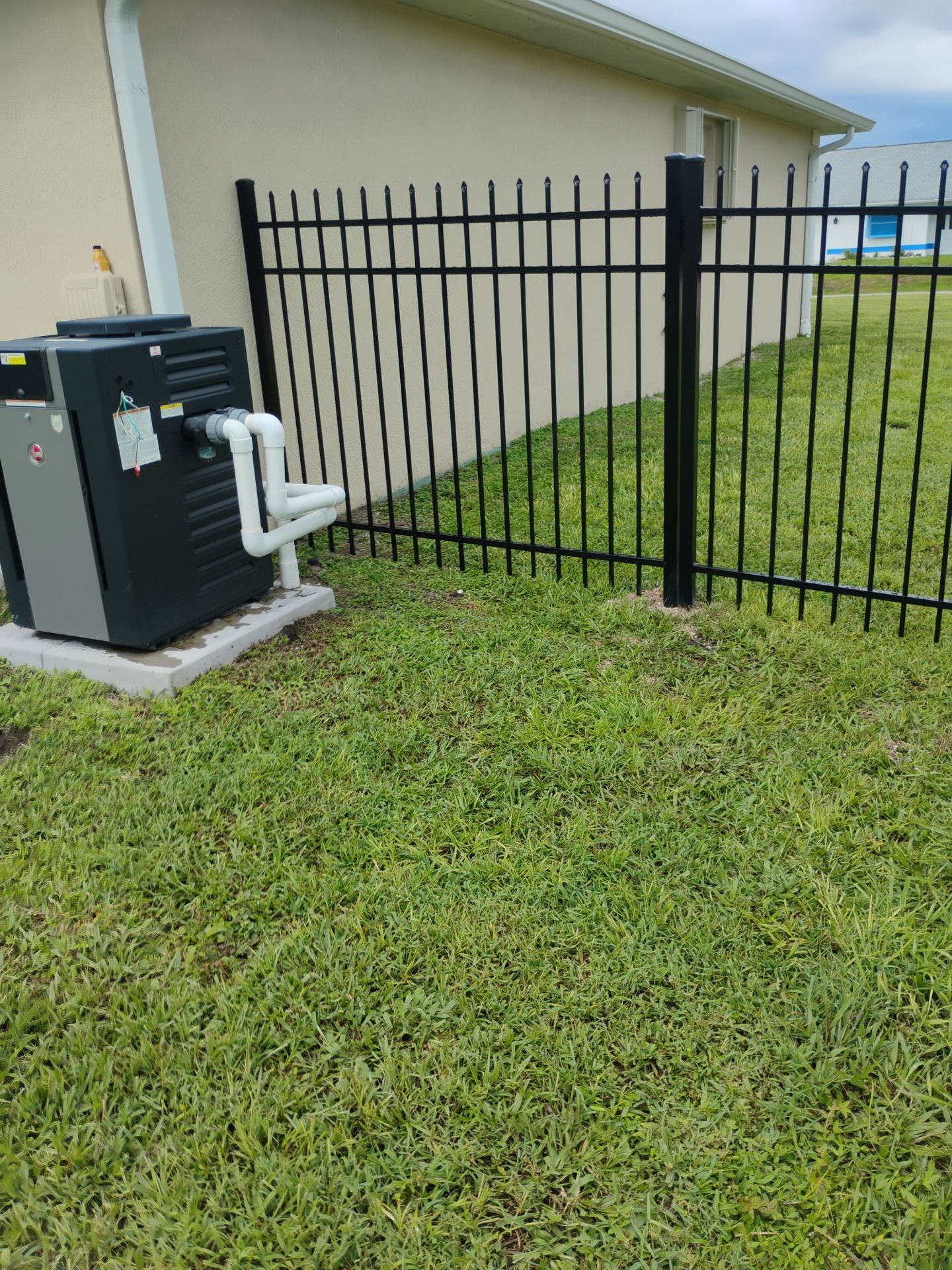 Black Aluminum Spear Top Picket Fence Installation in Englewood by True Fence LLC