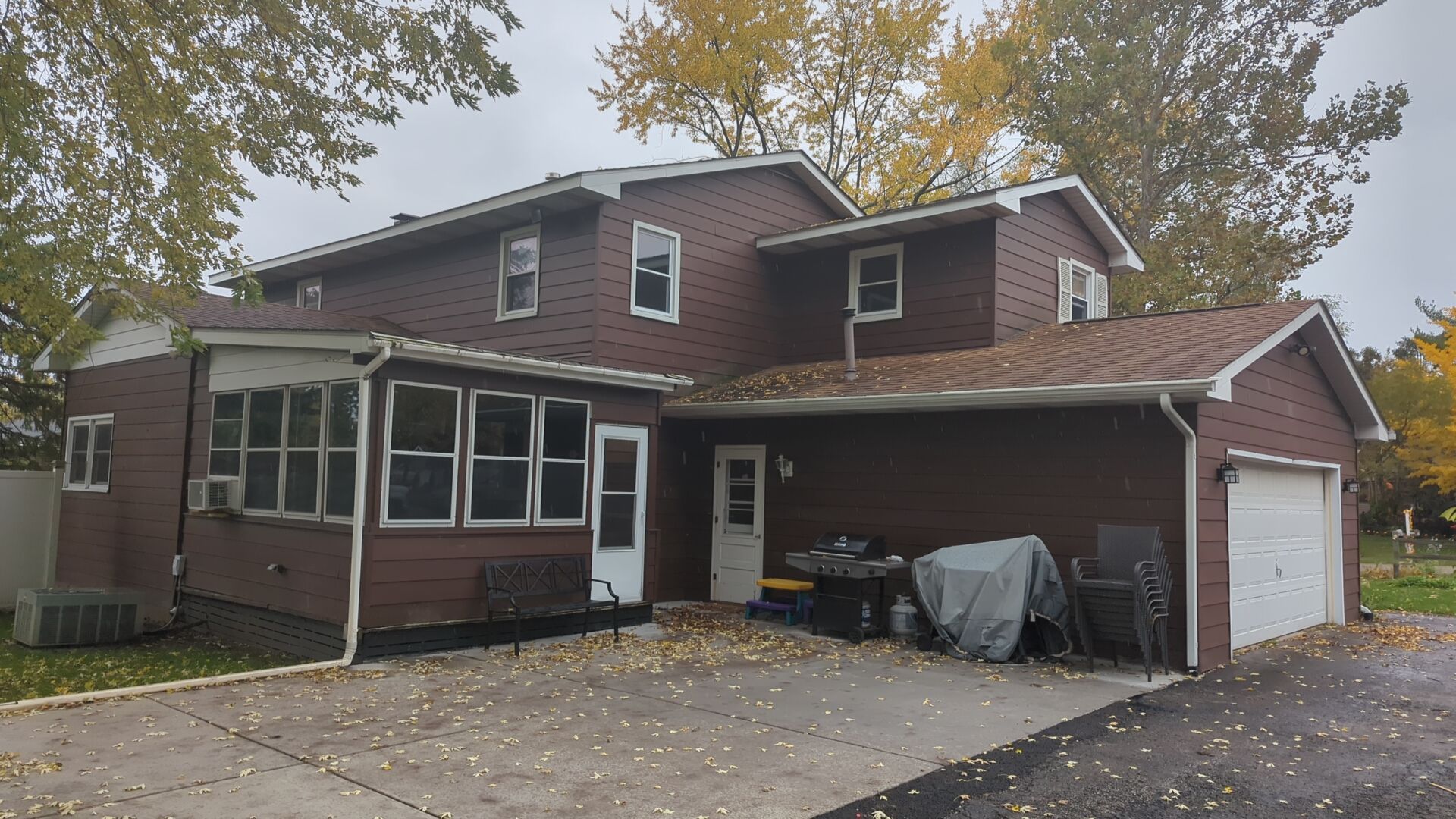 Vinyl siding replacement using CertainTeed Monogram double 5" vinyl siding by AJ Exteriors & Roofing Inc.