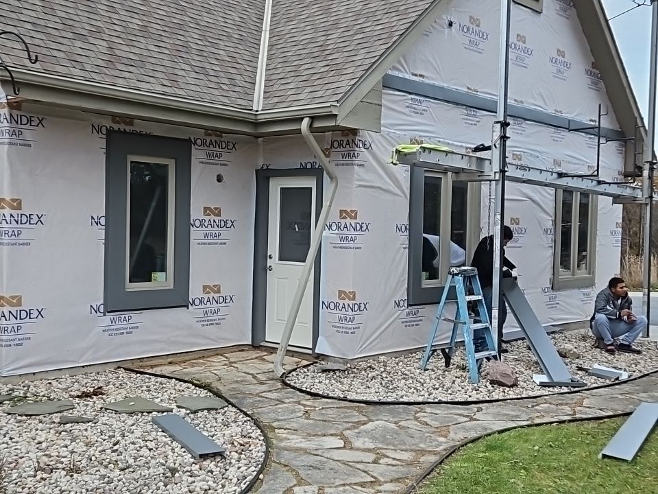 Siding Installation using Norandex Polar Wall Plus Siding, Window Wraps by Total Exteriors