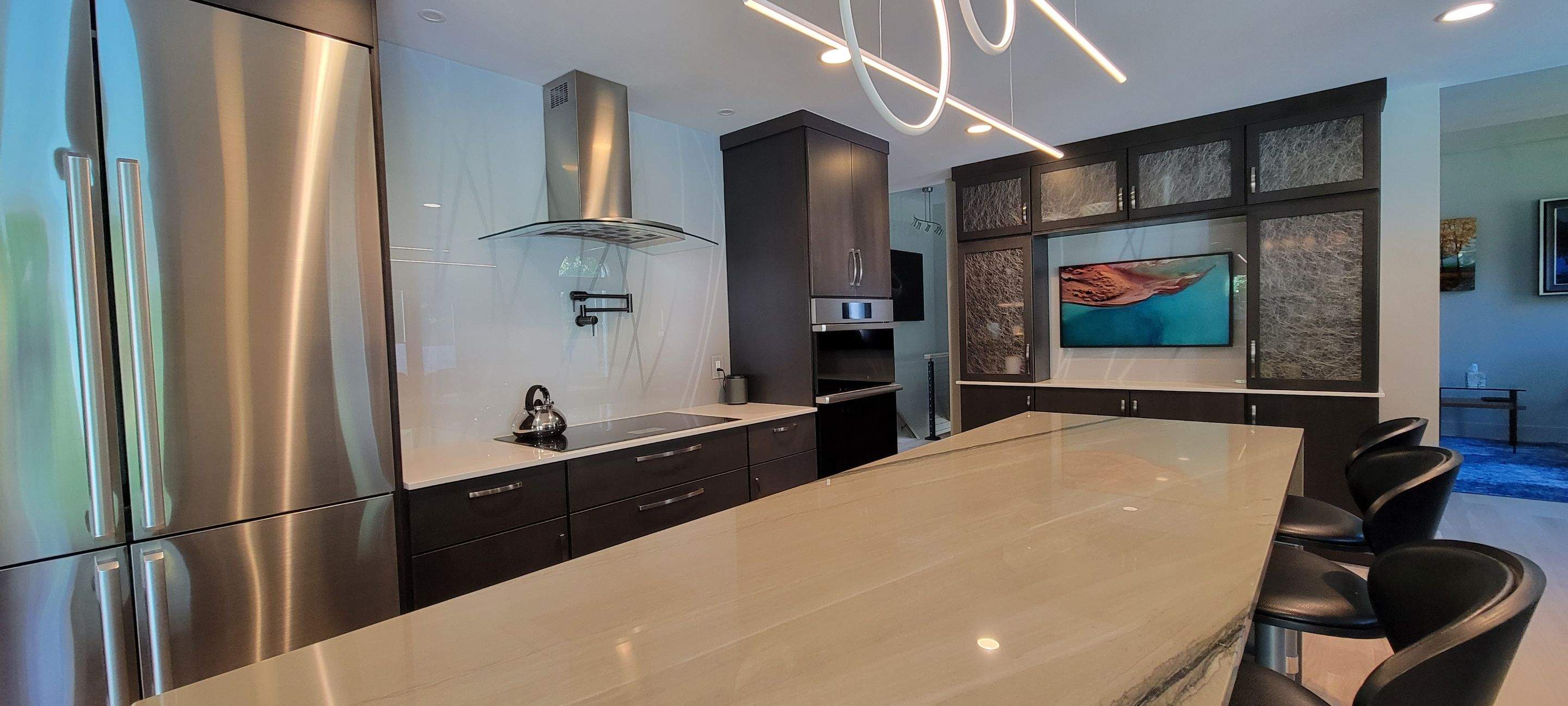 Kitchen Remodel using IMAGIO Misty Curves Solid Glass Backsplash by IMAGIO