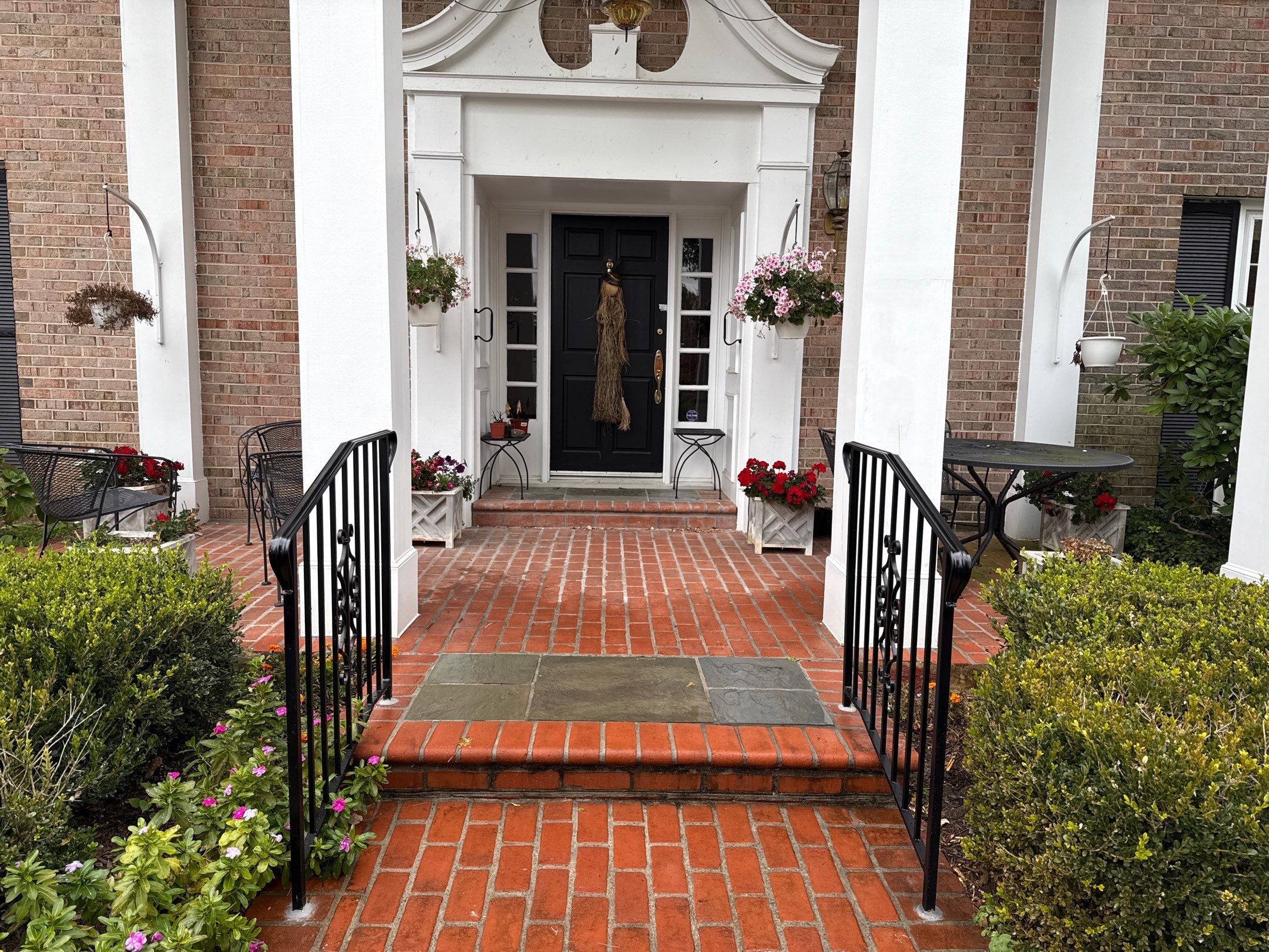 Wrought Iron Handrail Installation for Potomac Brick Entryway by Capitol Iron Works