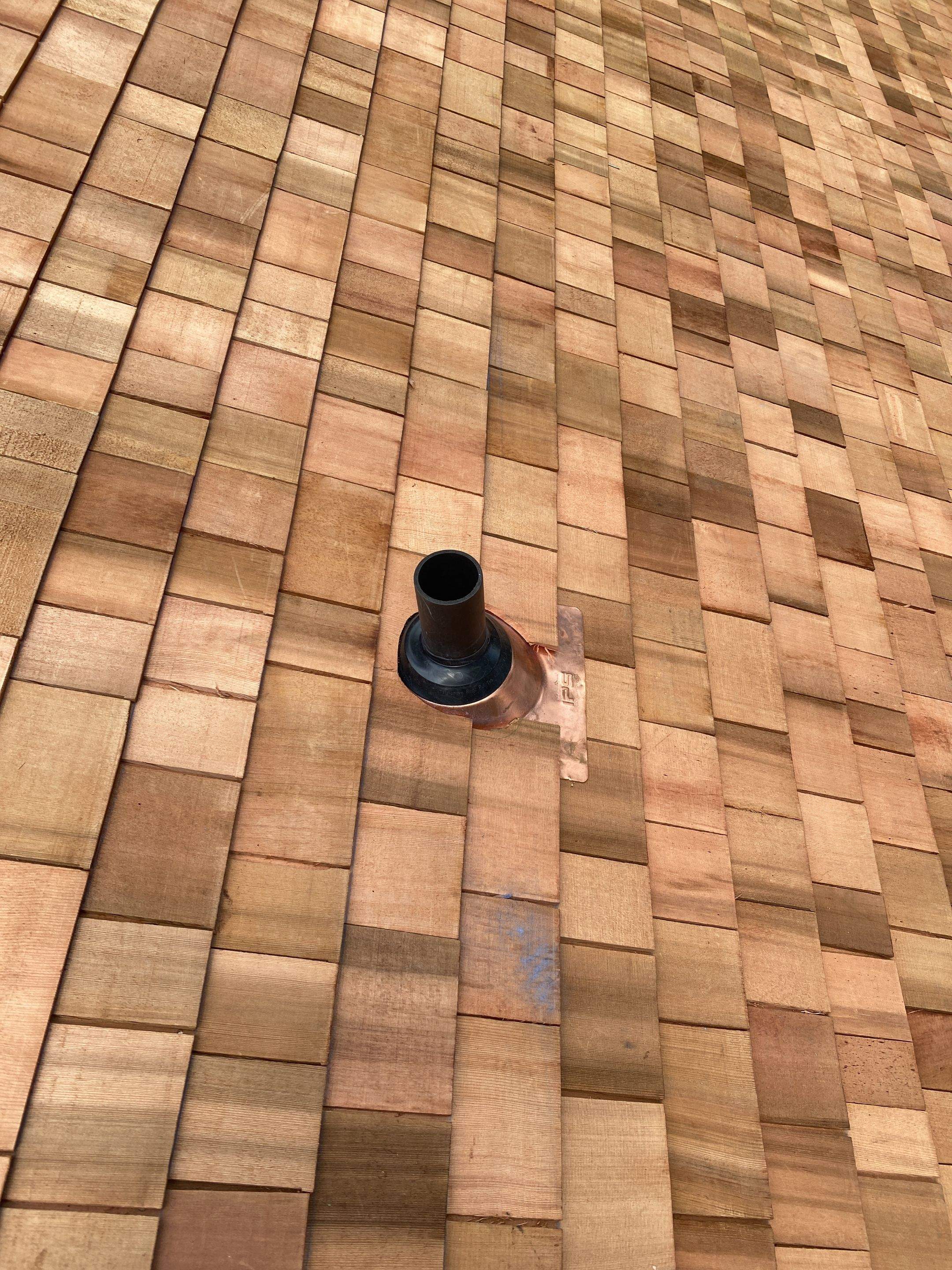 Residential Roofing Installation using Wood Shake by A Plus Exterior
