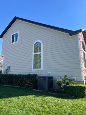 Farmington | Stucco/Vinyl Demo & Hardie Conversion | Cobble Stone & Black