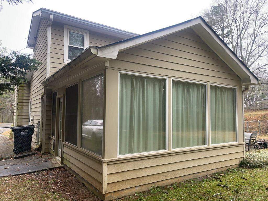 Marietta, GA Siding, Rotten Wood, Front Door, and Gutter Replacement with Exterior Painting by Nelson Exteriors